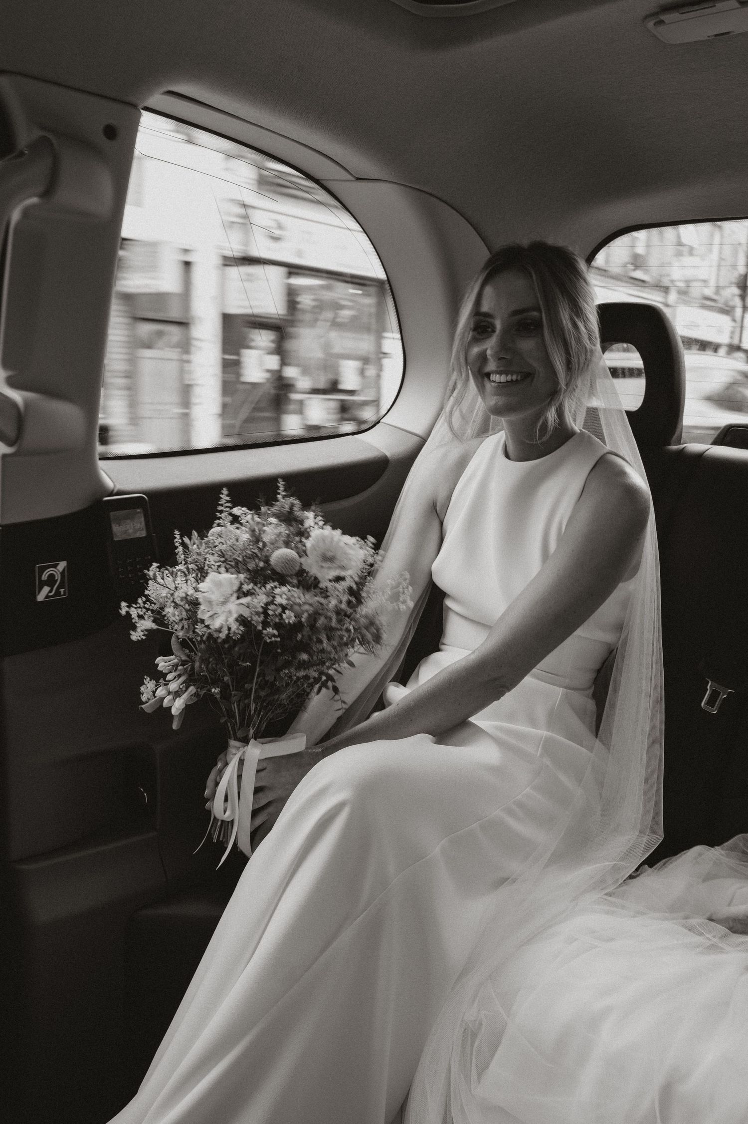 A series of candid moments showing a bride in a white dress with a bouquet sitting in a car backseat.