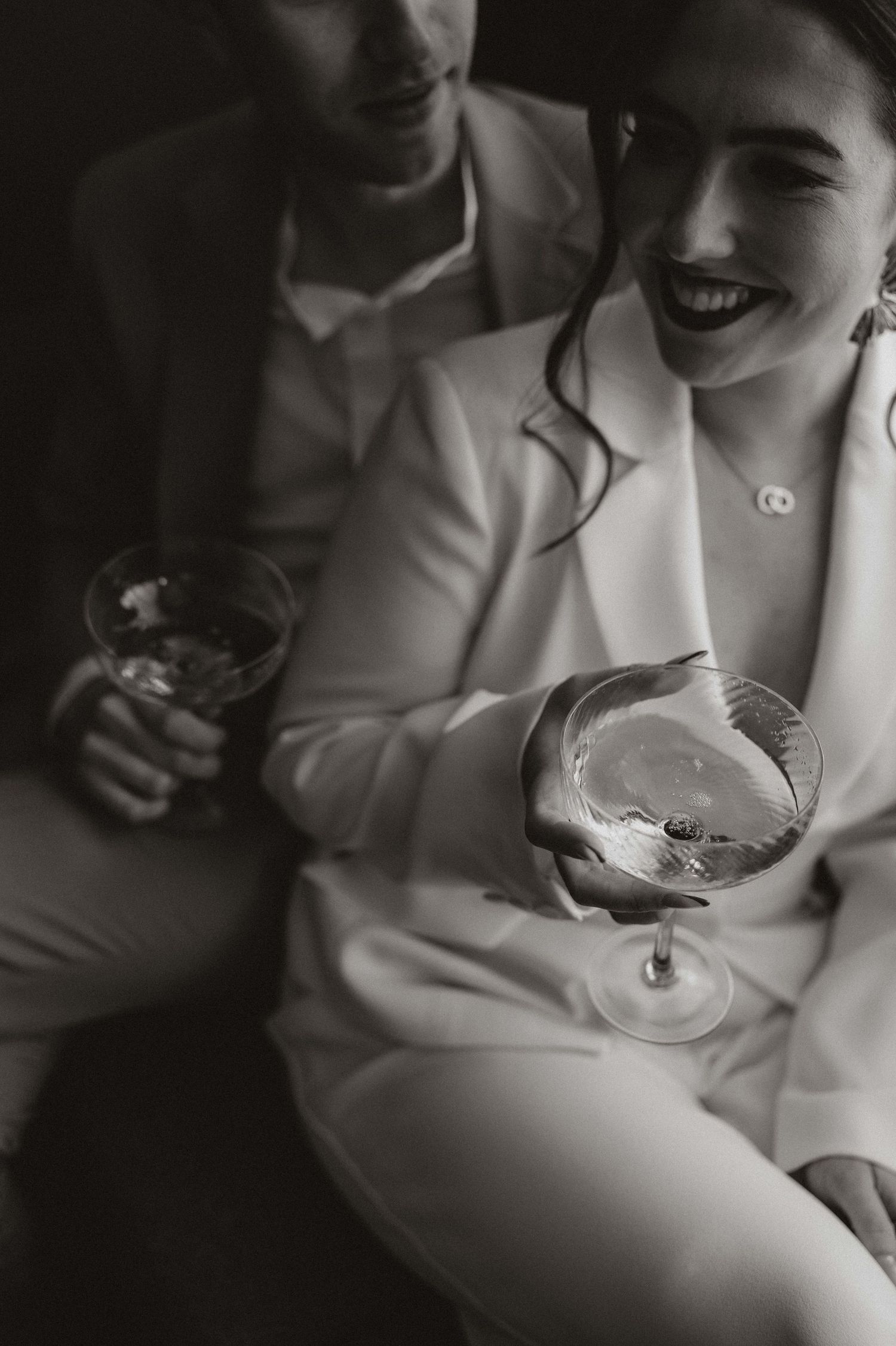 A series of intimate black and white photos showing a couple embracing and sharing tender moments together.