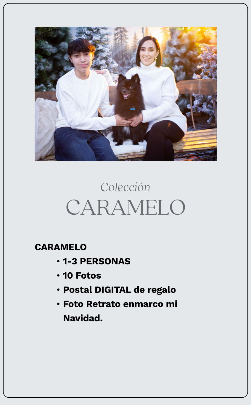 A couple in white sweaters sits with a black Pomeranian dog outdoors in a snowy Christmas setting for the Caramelo photo collection.