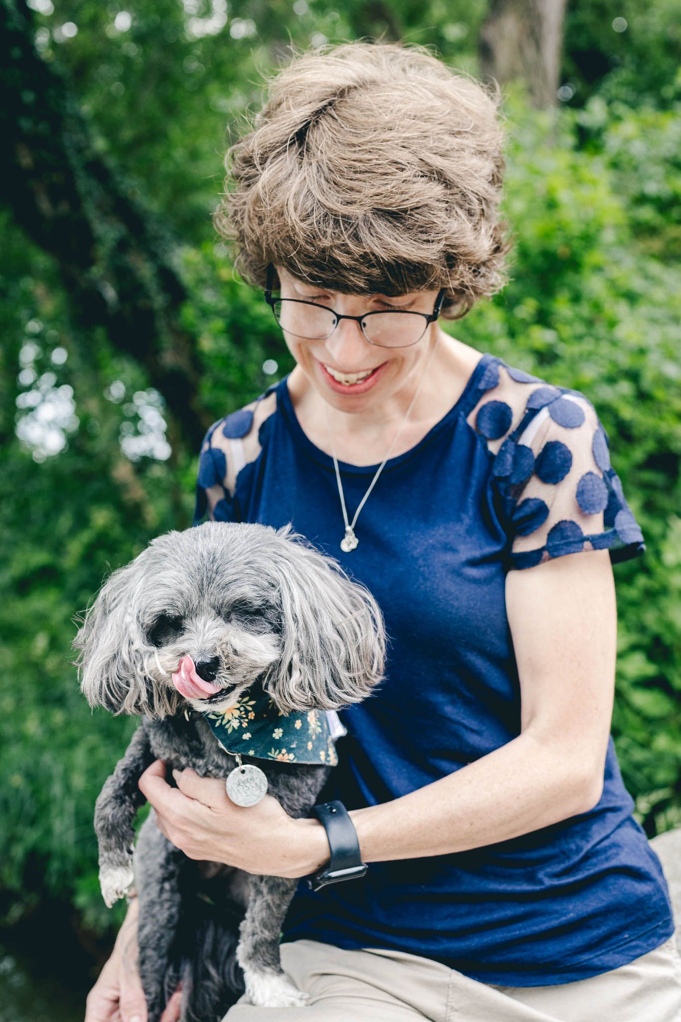 Portrait of a woman and her pet dog