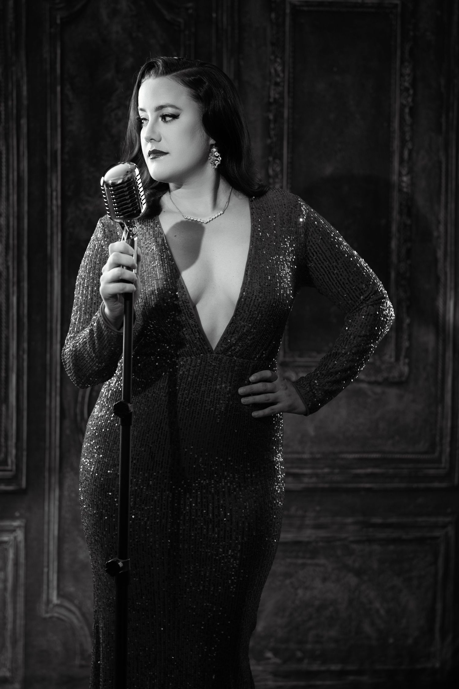 Dramatic black and white photo series showing sparkly evening gown against dark vintage backdrop.