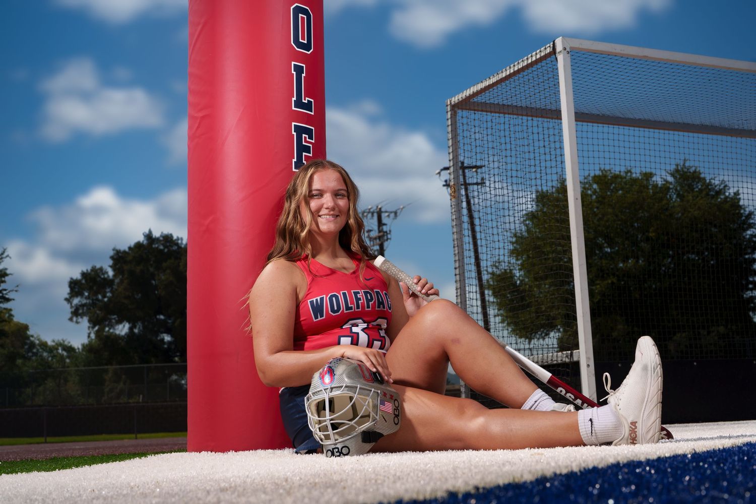 A series of outdoor sports field photos with red goal posts and blue sky visible in the background.