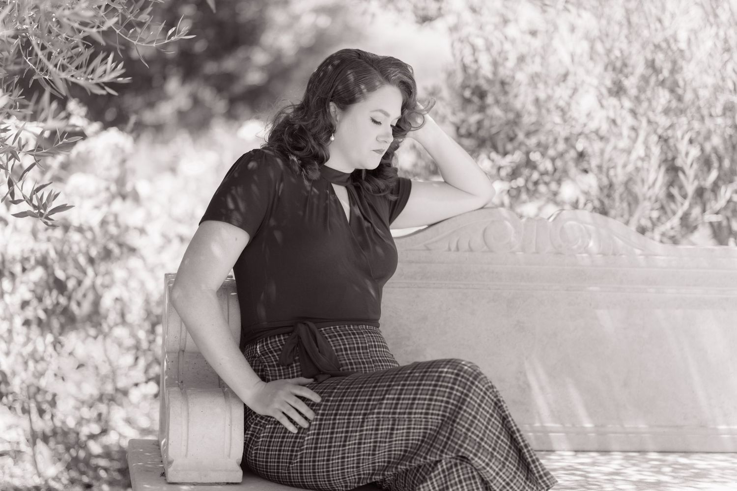 Black and white outdoor portrait photography series in a natural setting.