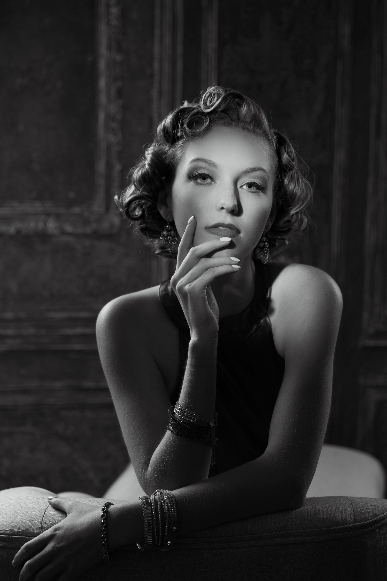 Classic Hollywood glamour portraits in black and white with dramatic lighting and styling.