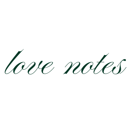 Elegant cursive text reading 'love notes' written in dark green calligraphy against a white background.