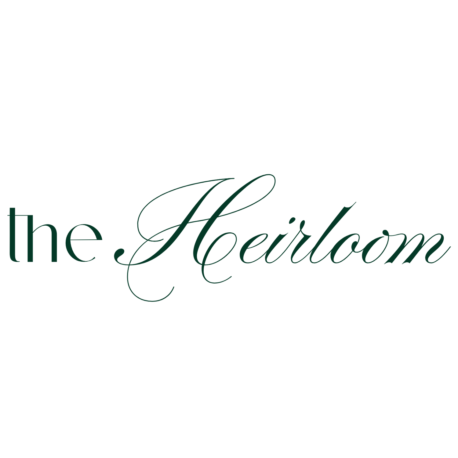 Elegant script typography displaying 'the Heirloom' in dark green lettering.