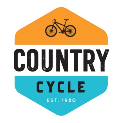 Country Cycle est. 1980 logo featuring a mountain bike silhouette on an orange and blue hexagonal badge.
