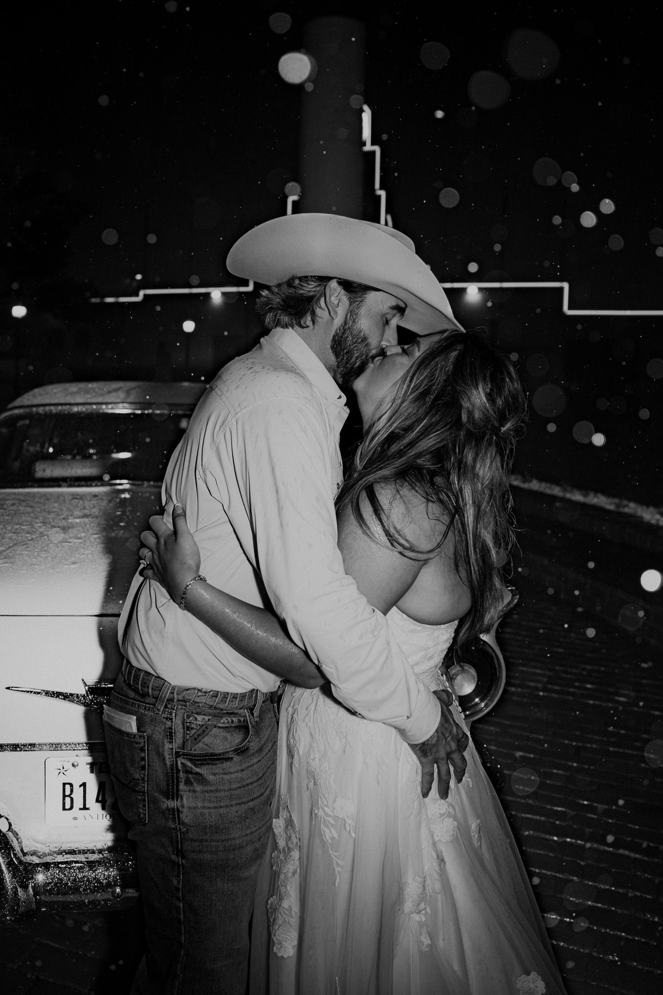 A romantic black and white photo sequence of a couple dancing at their wedding reception.