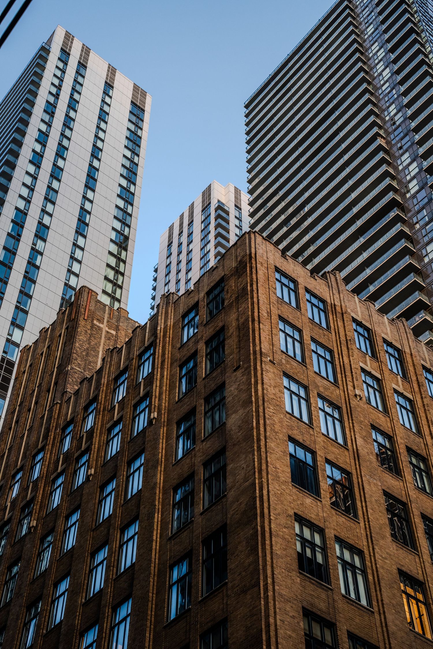 Urban photography showing city life’s energy, candid street moments, and architectural details with natural light.