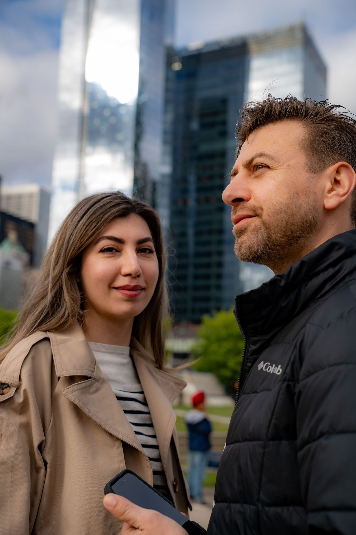 Candid moments of couples sharing laughter and love in outdoor settings with warm, natural light.