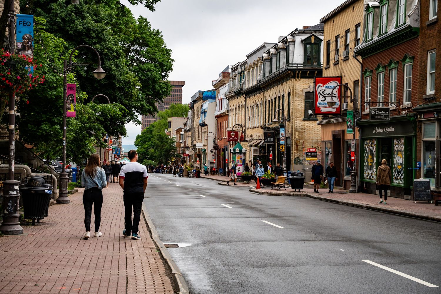 Urban photography showing city life’s energy, candid street moments, and architectural details with natural light.