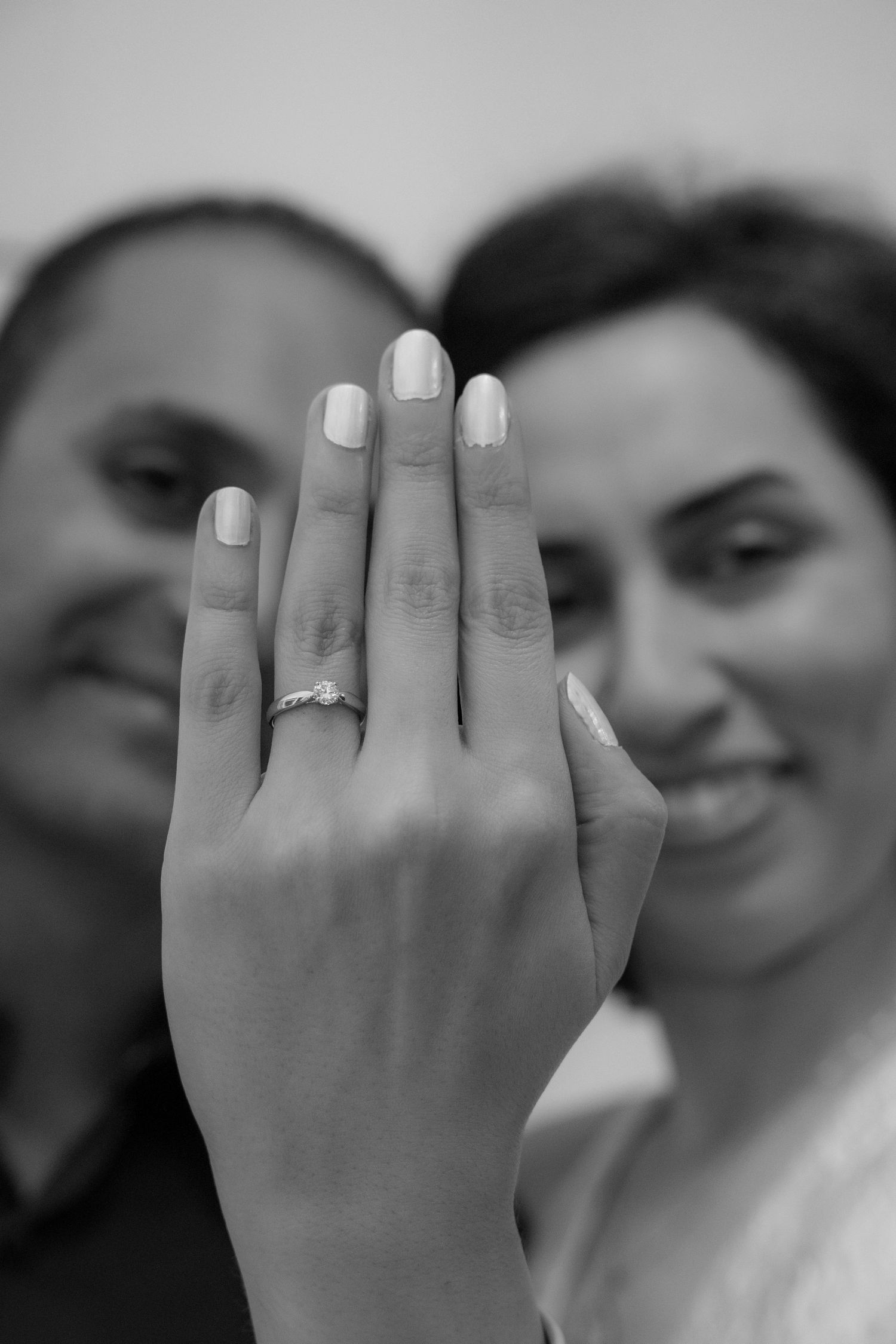 Candid moments of couples sharing laughter and love in outdoor settings with warm, natural light.