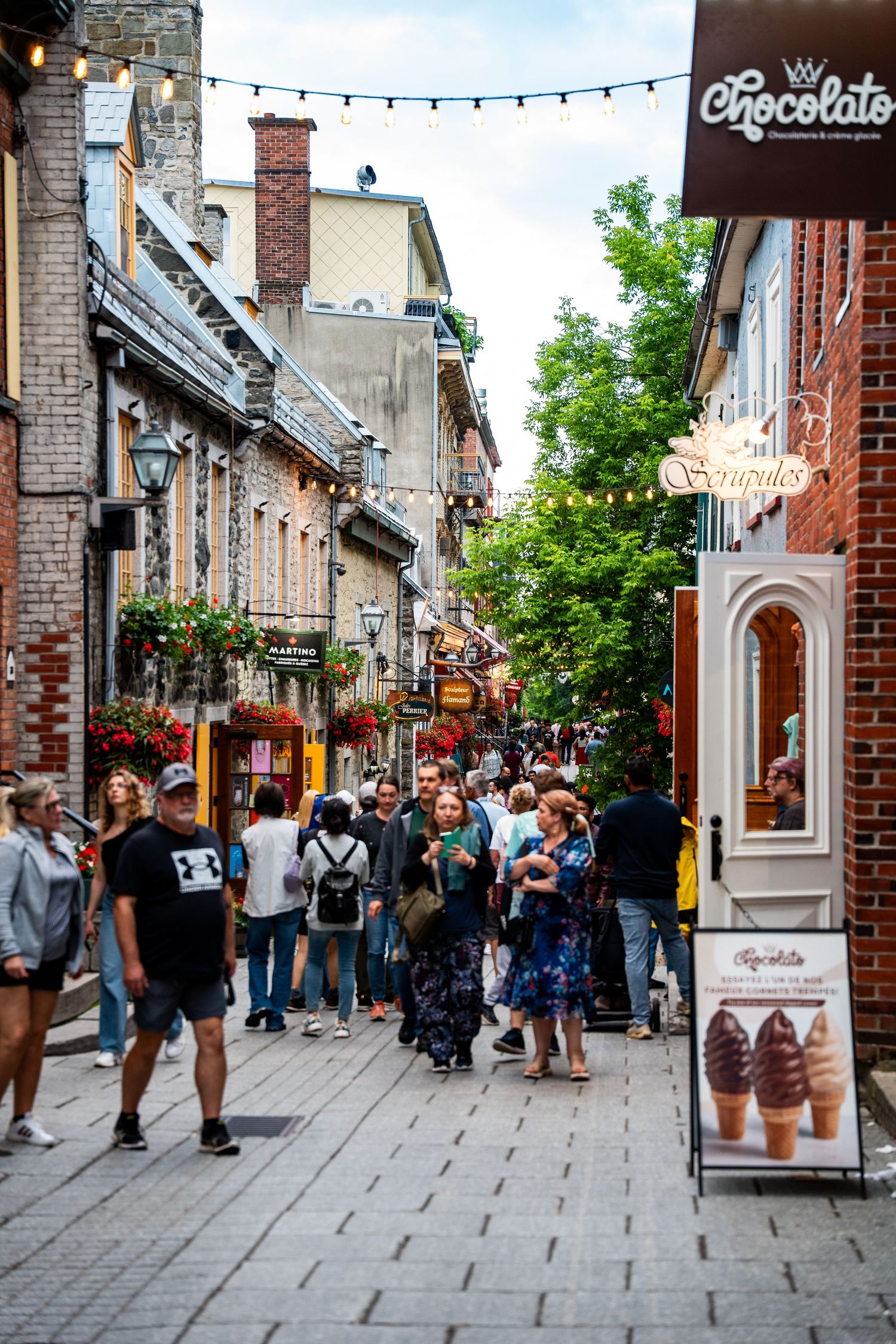 Urban photography showing city life’s energy, candid street moments, and architectural details with natural light.