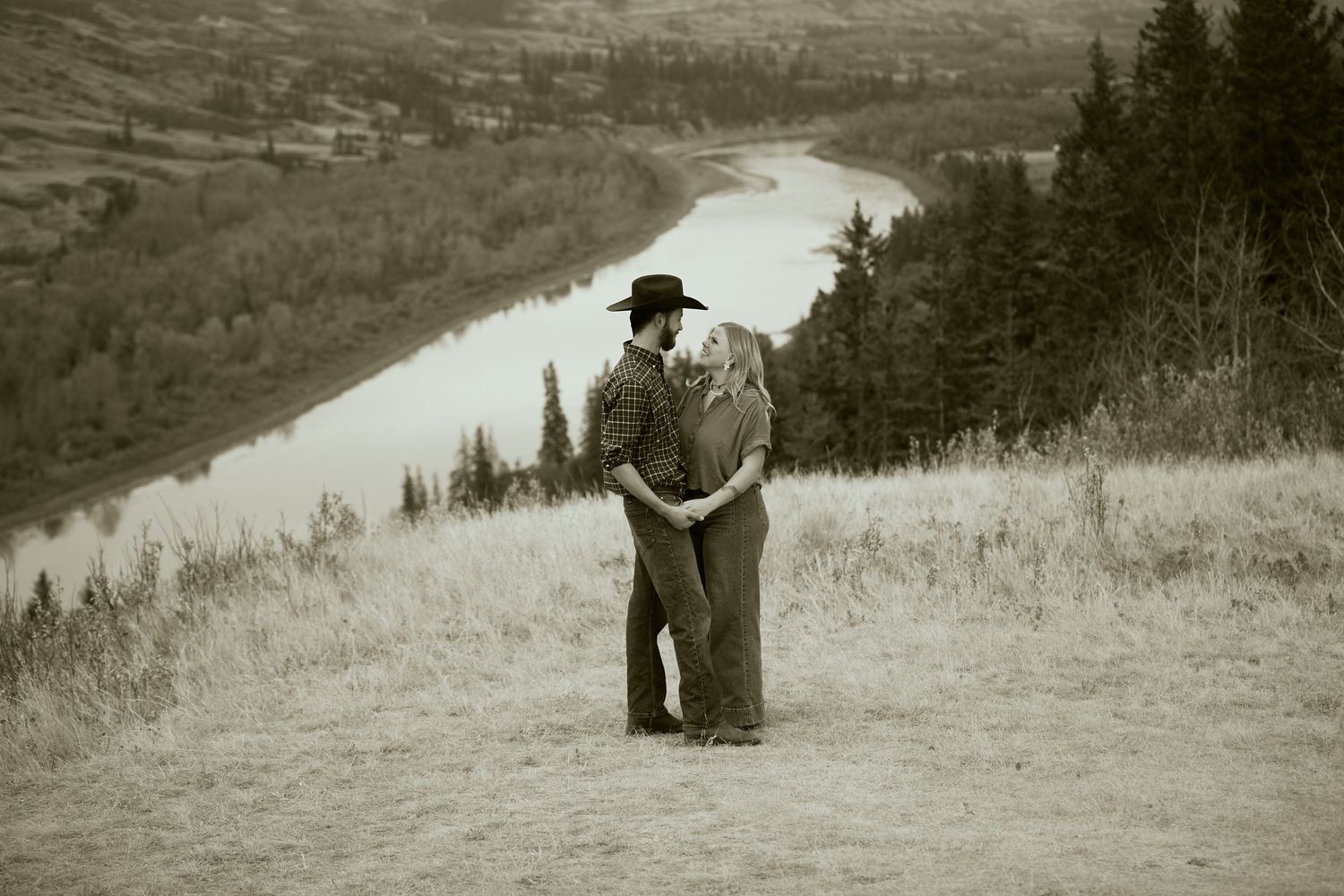 A sequence of vintage sepia photographs showing someone walking across a grassy hillside landscape.