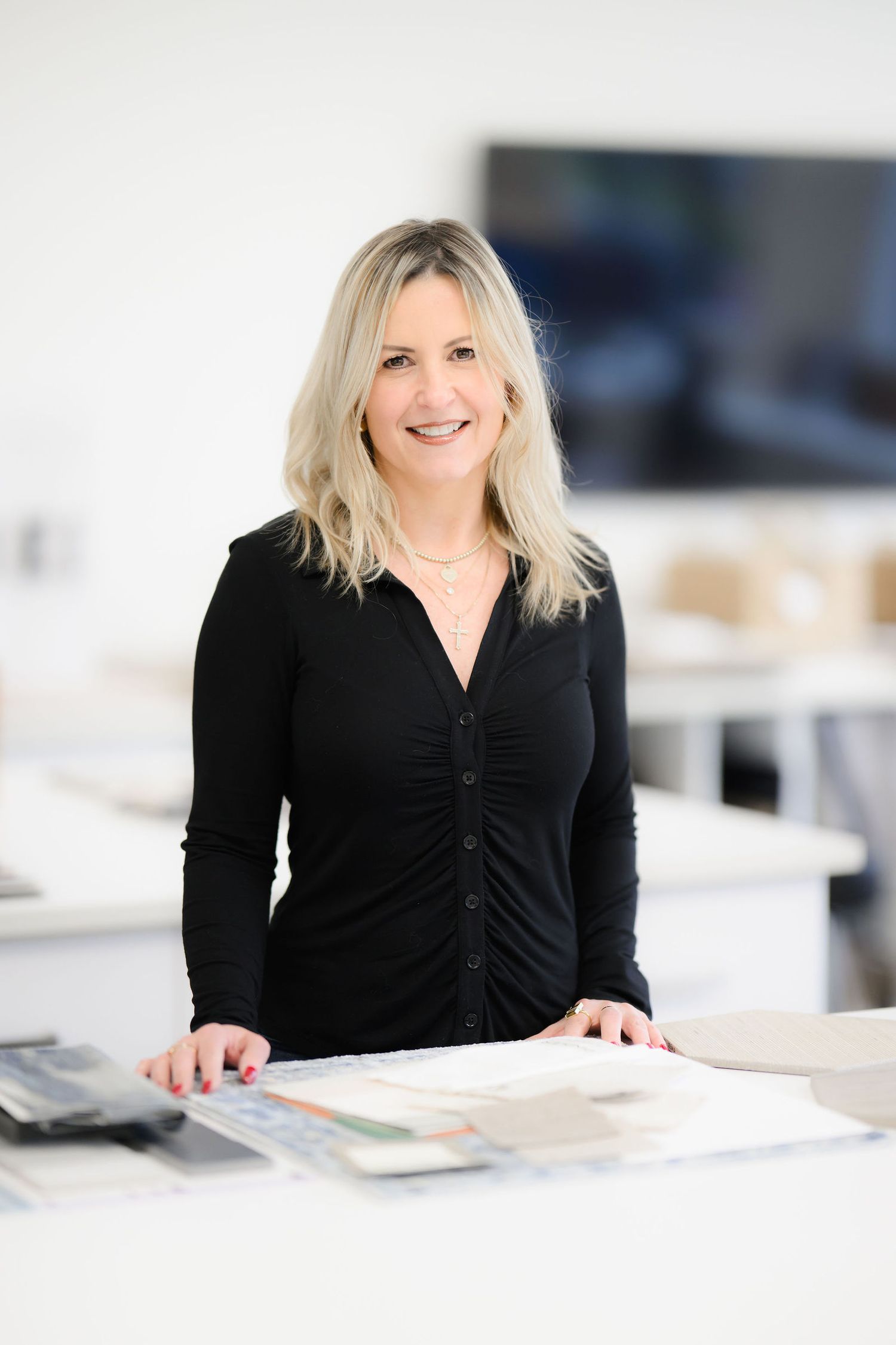 Kasia at work at her design firm in rancho Bernardo in San Diego county posing for the companies headshot to use on their staffing page.