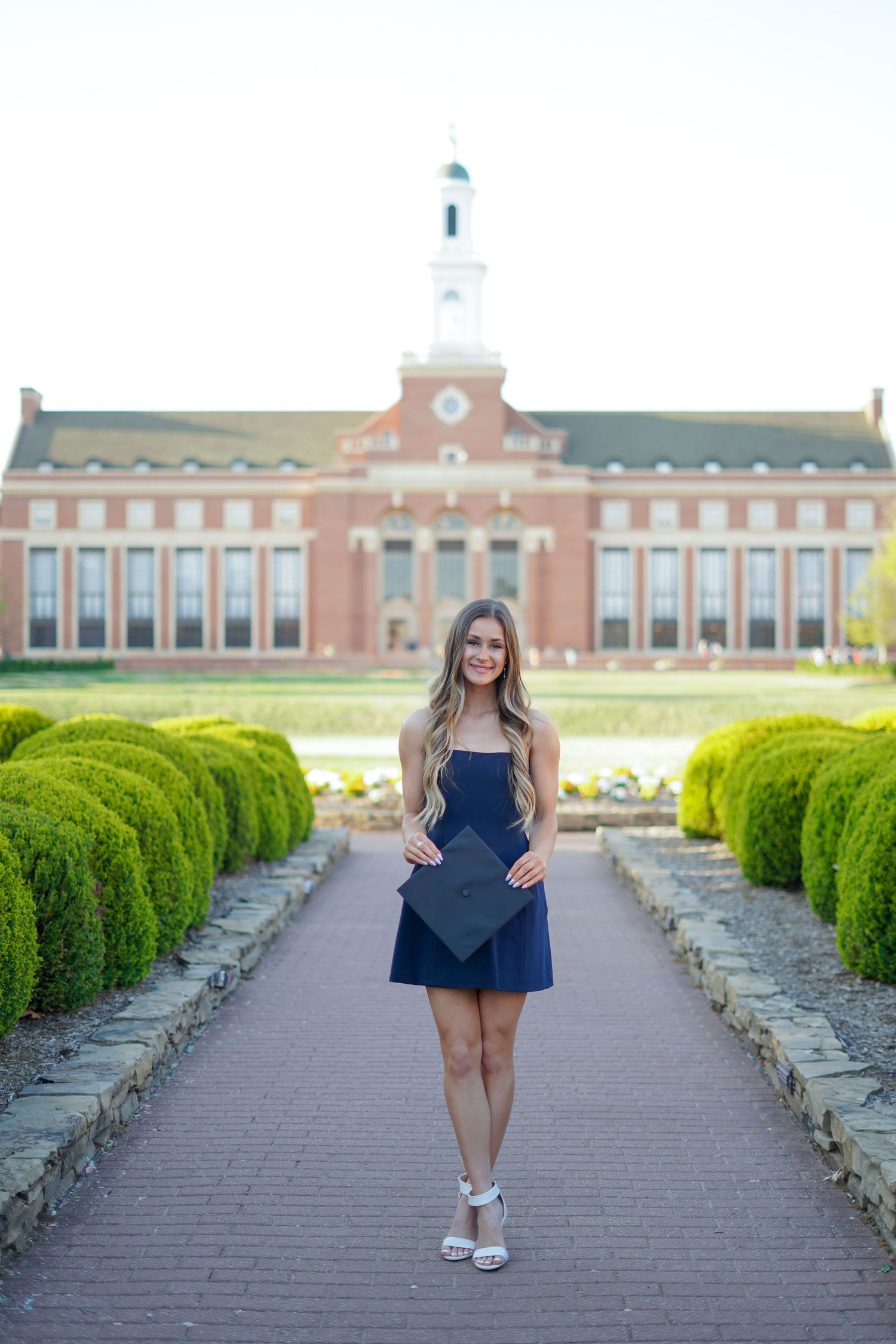 Graduation photographer for OU in Norman and OSU in Stillwater. Bold, true-to-color portraits to celebrate your achievement.