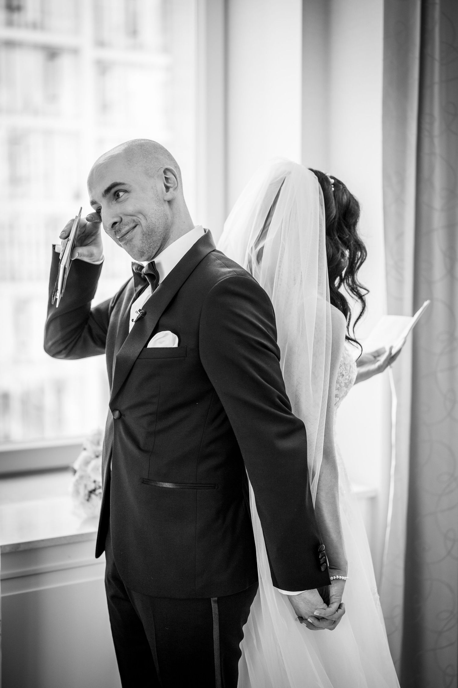 Bride and groom read emotional letters to eachother