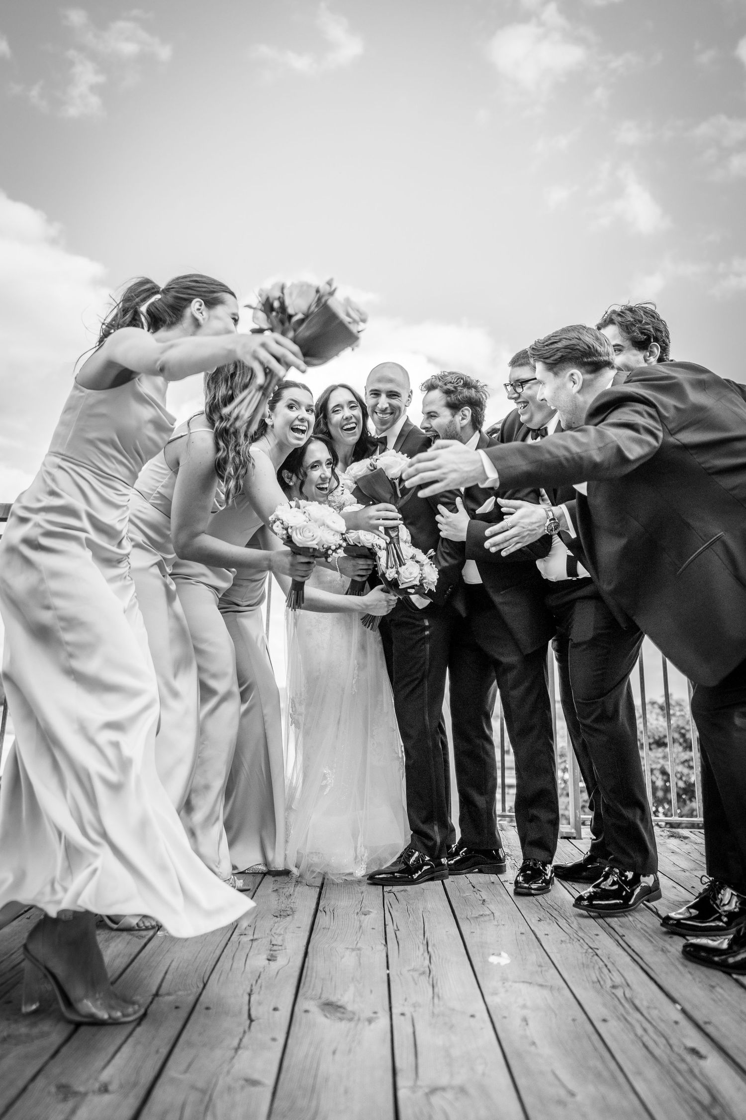 Wedding party having a good time by the Old Port of Montreal