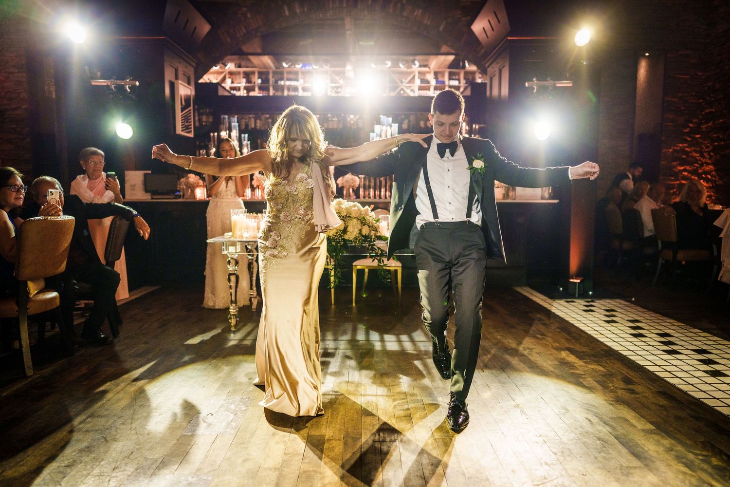 Groom dances with his mother at his wedding reception at 40 West in Montreal, Quebec