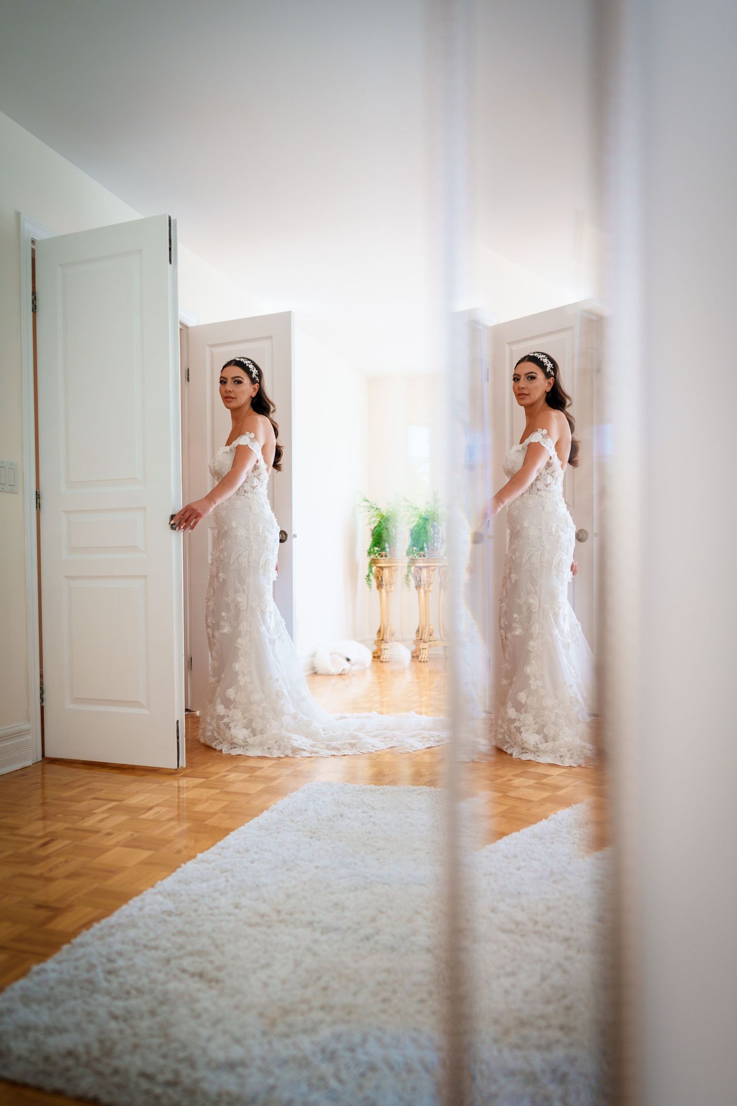 Bride exiting her room in her wedding dress in Laval, Quebec