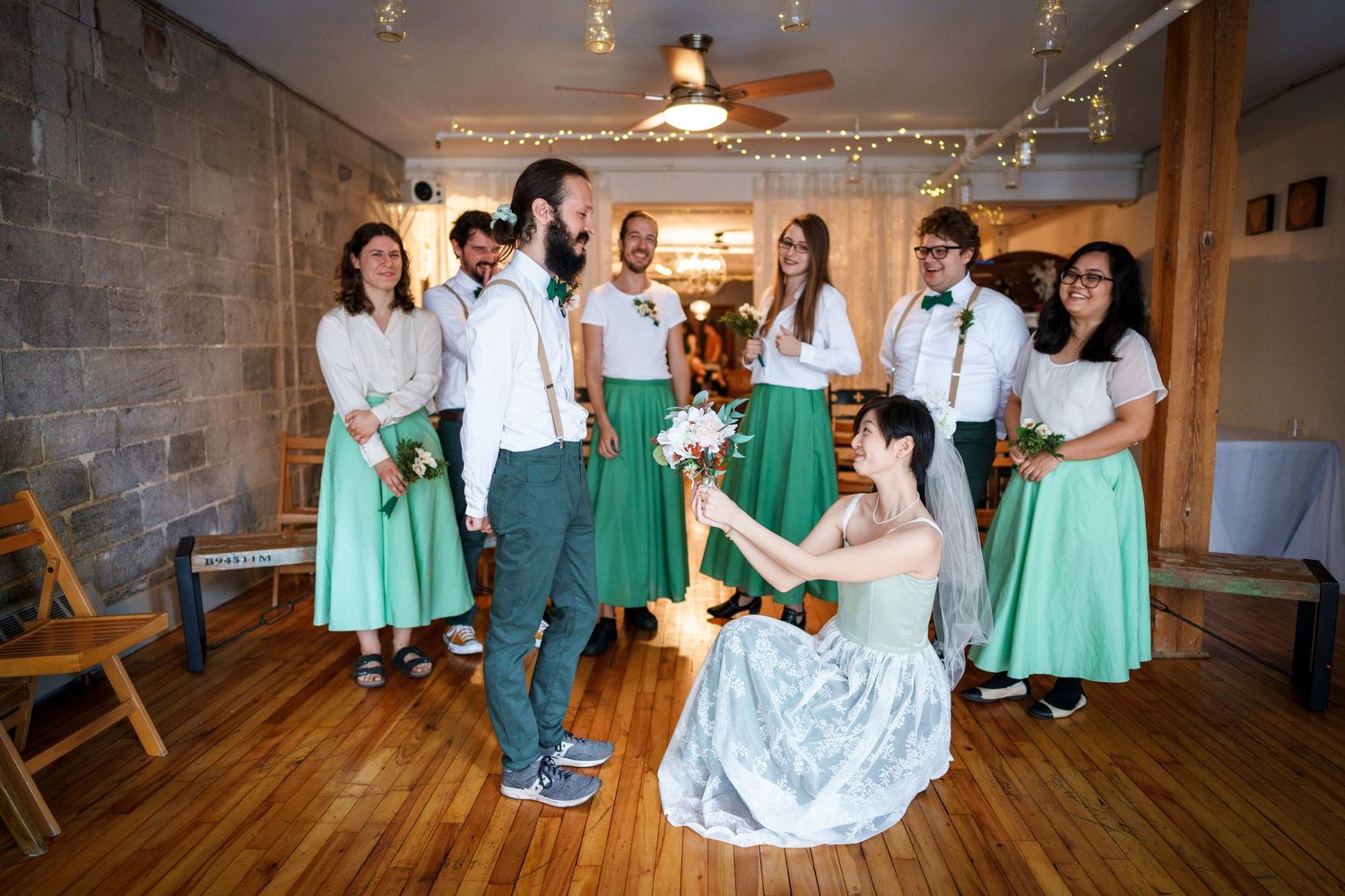 Bride giving her bouquet to her husband