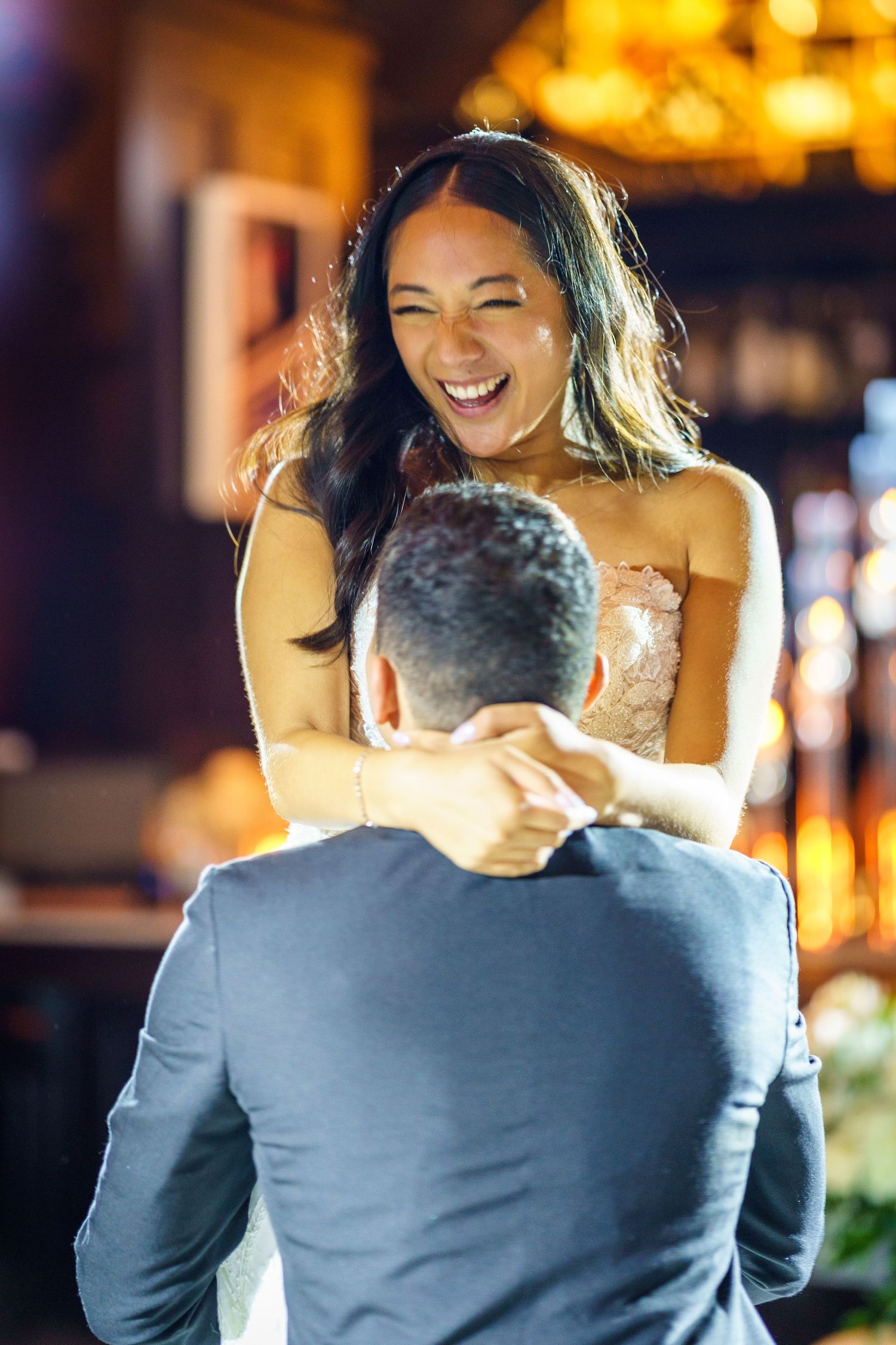 Groom lifting his bride at 40 West restaurant in Montreal