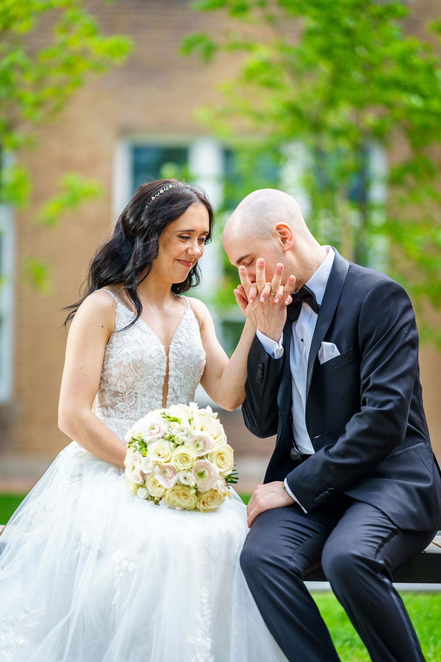 Husband kissing wife's hand