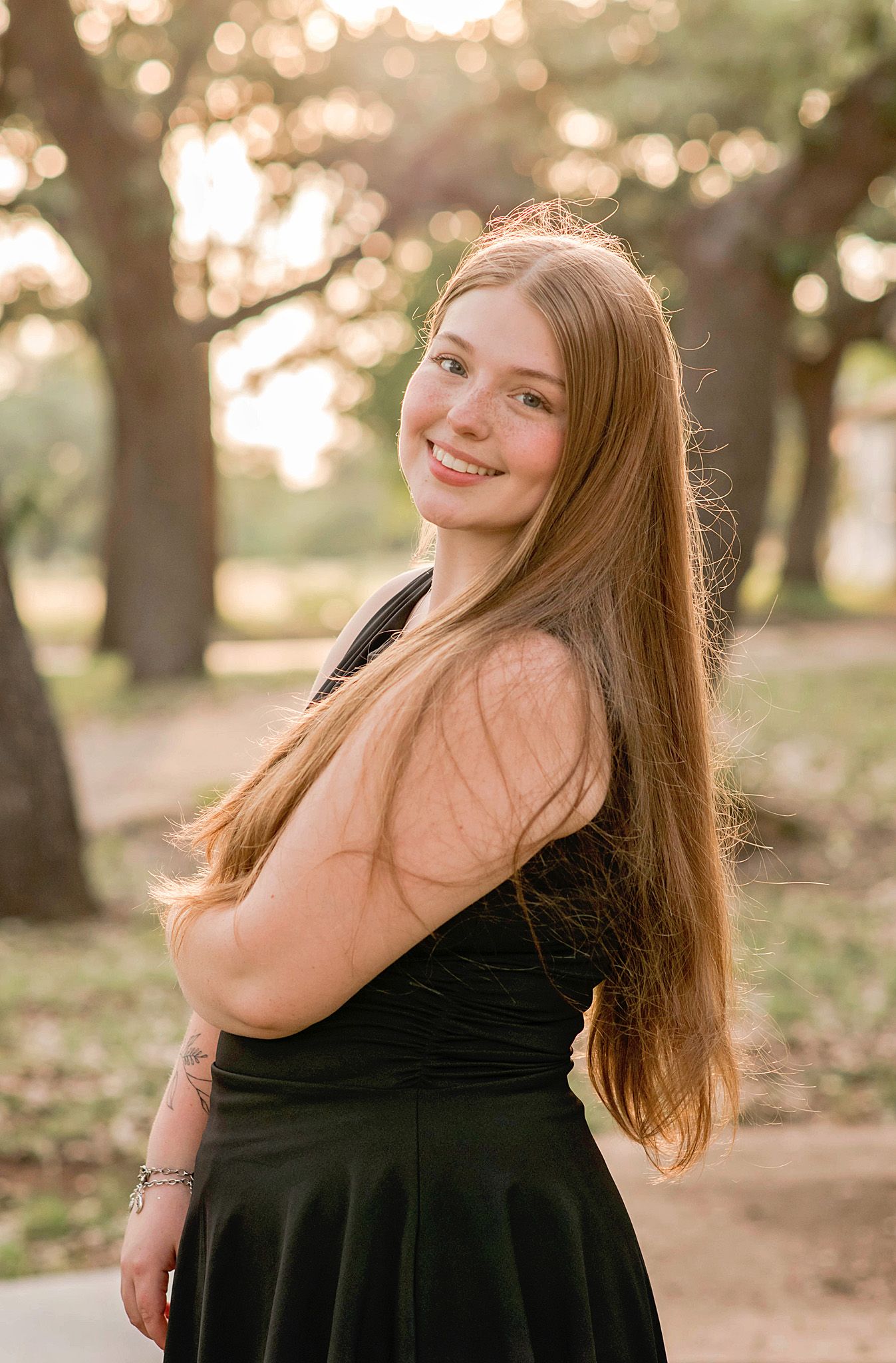 A series of outdoor portrait photos in a park with golden sunlight filtering through trees in the background.