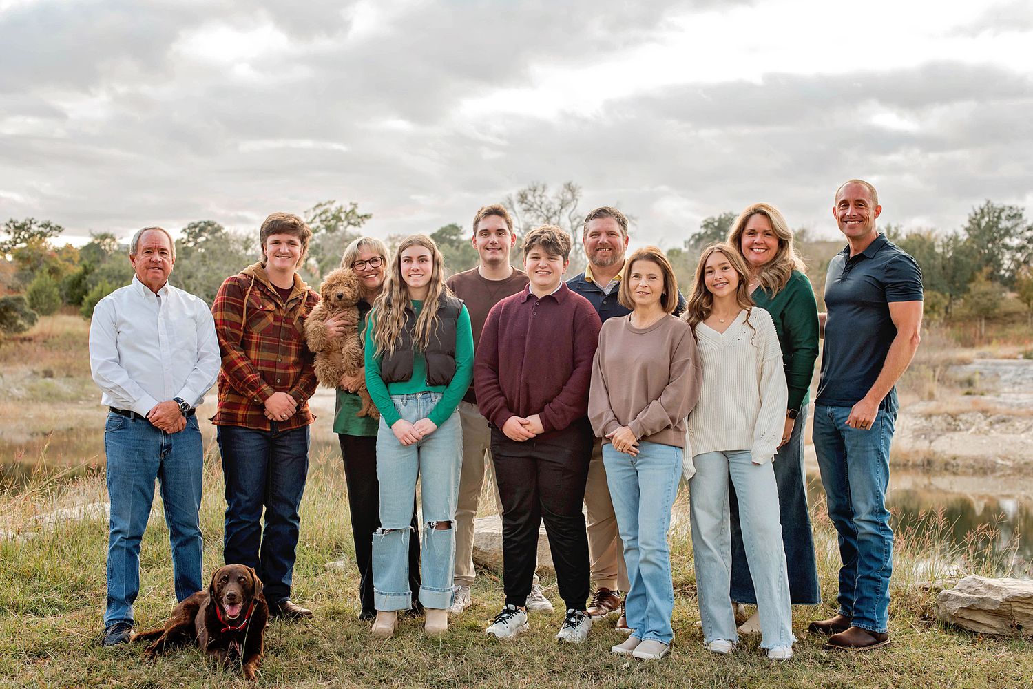A series of outdoor family portrait photos showing people standing together in casual attire against natural backgrounds.