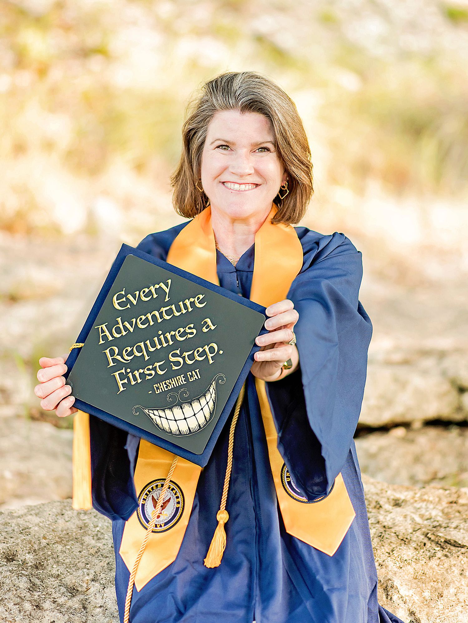 A graduation photo series featuring someone in blue cap and gown holding up decorative signs in an outdoor setting.