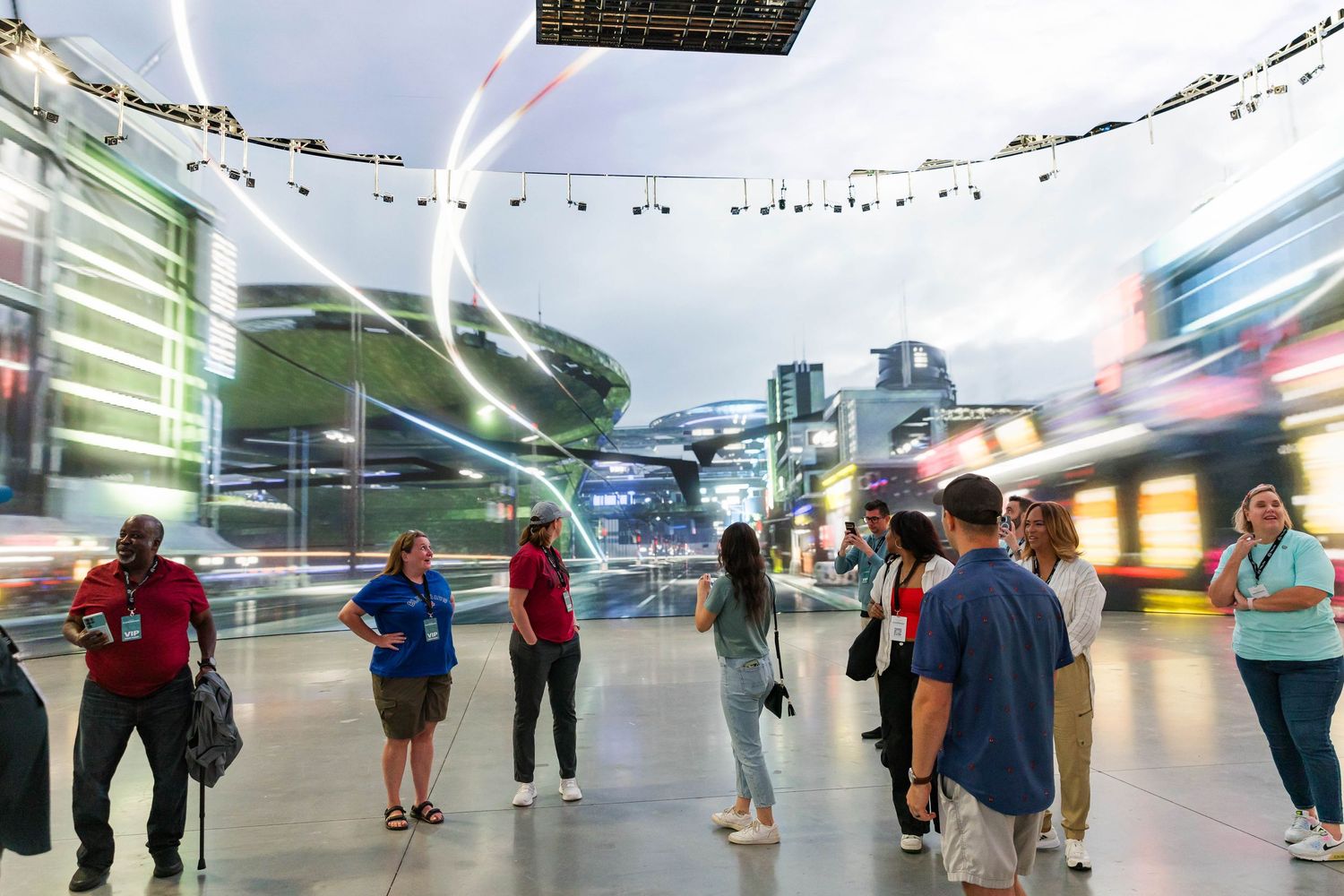 People gathered at an observation deck enjoying panoramic views under blue skies.