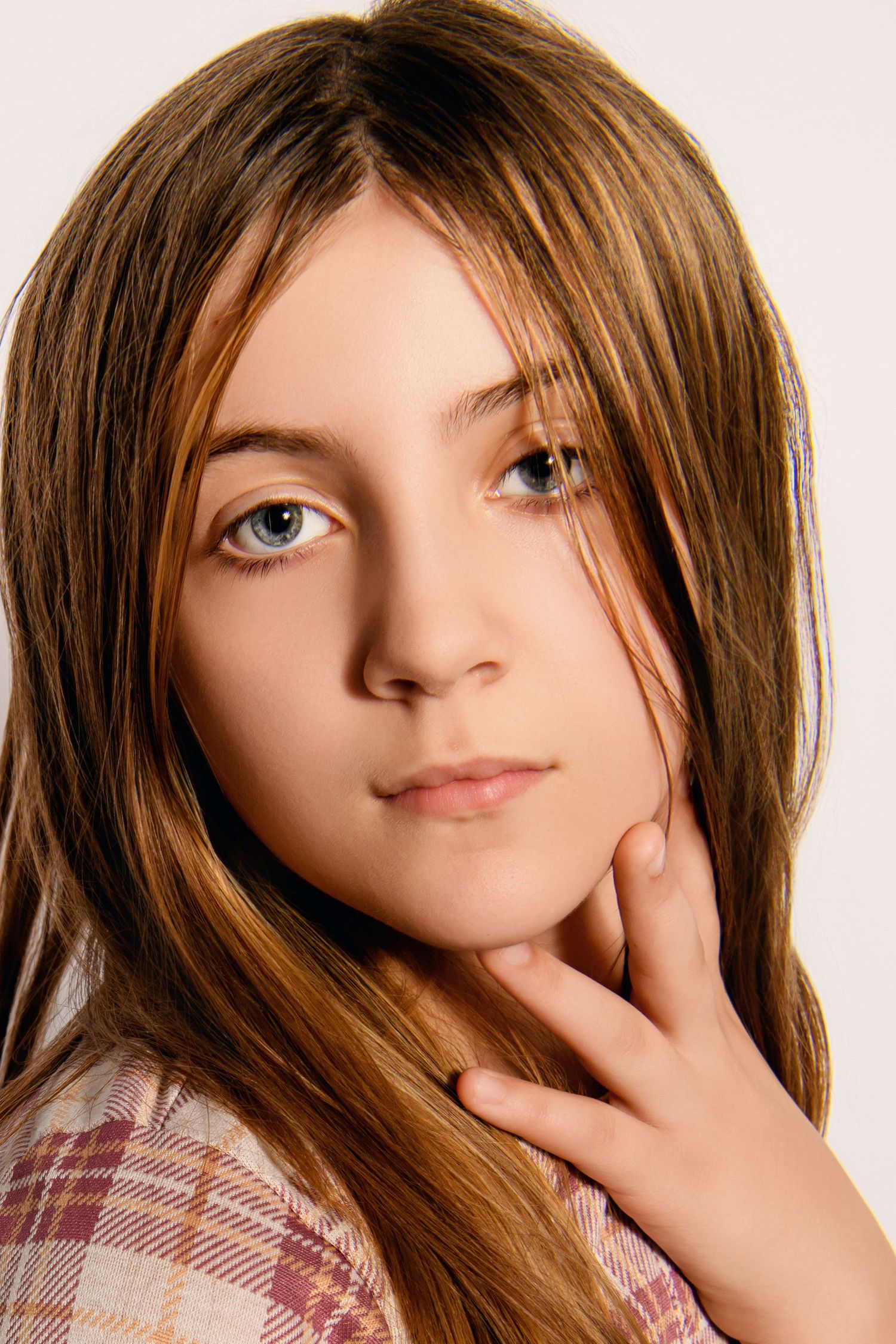 Close-up portrait series showing brown hair and natural makeup against white background.