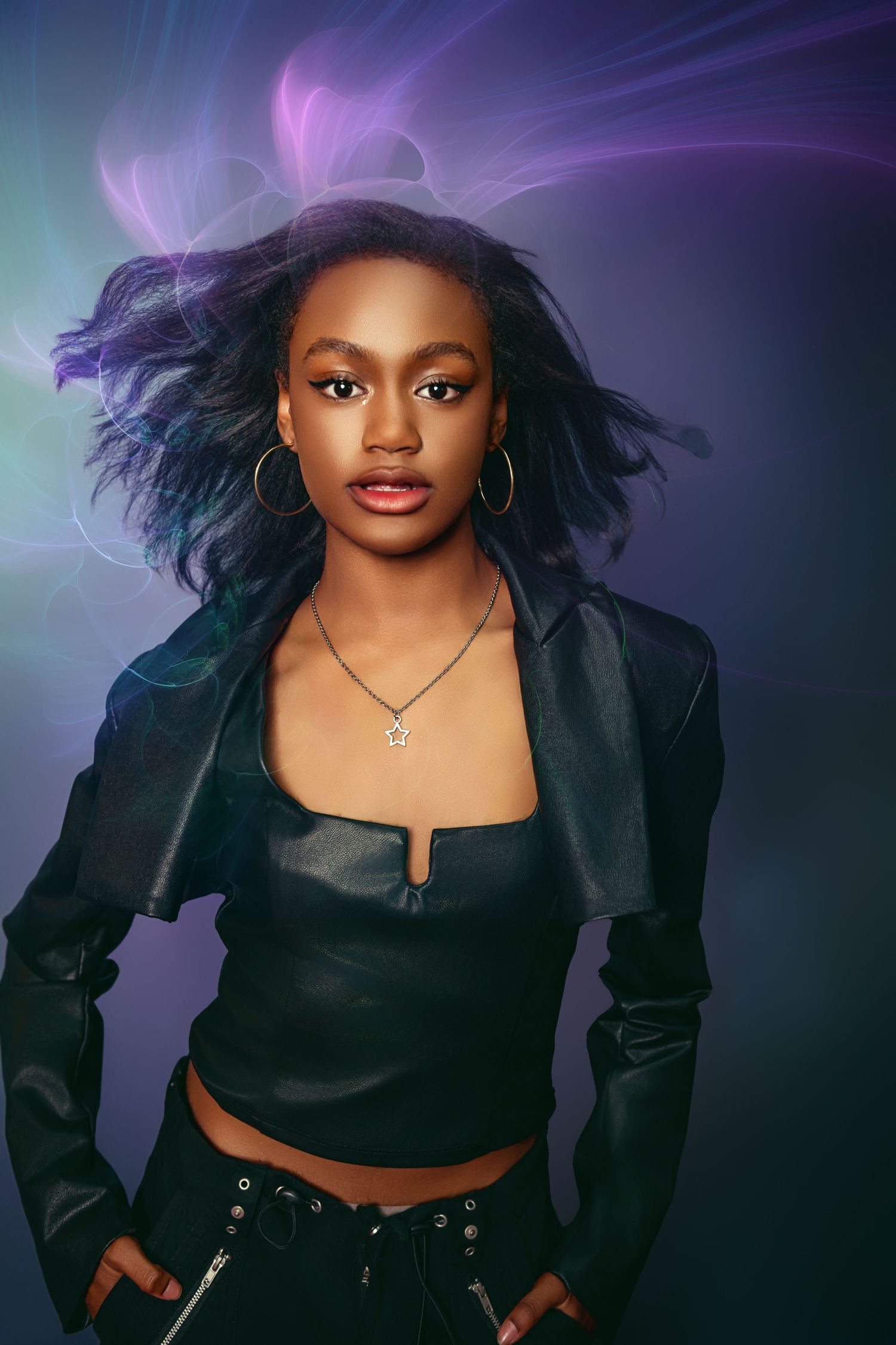 Artistic fashion portrait with model in black outfit against purple-tinted background.