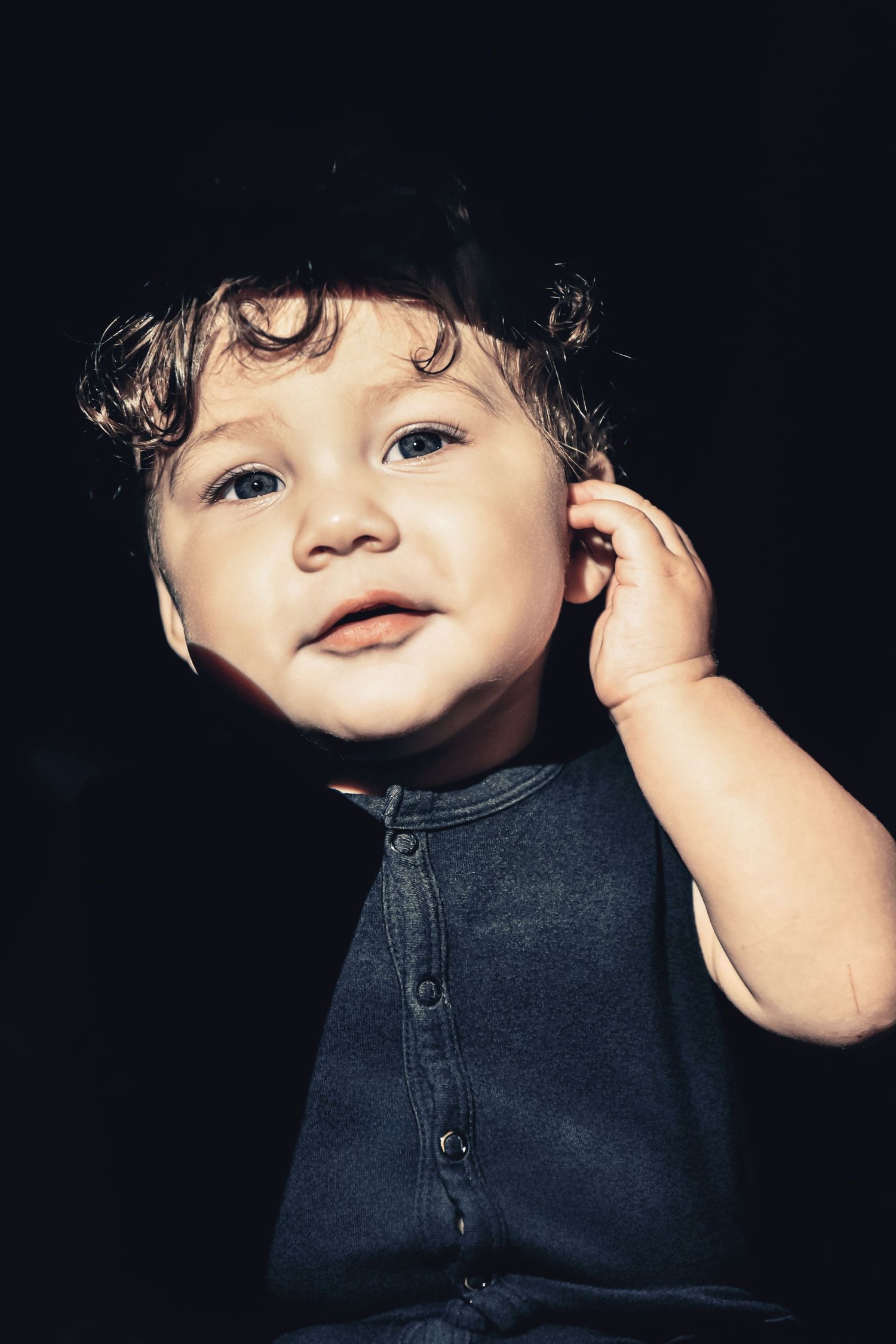 Close-up portrait sequence showing expressive eyes and dark clothing.