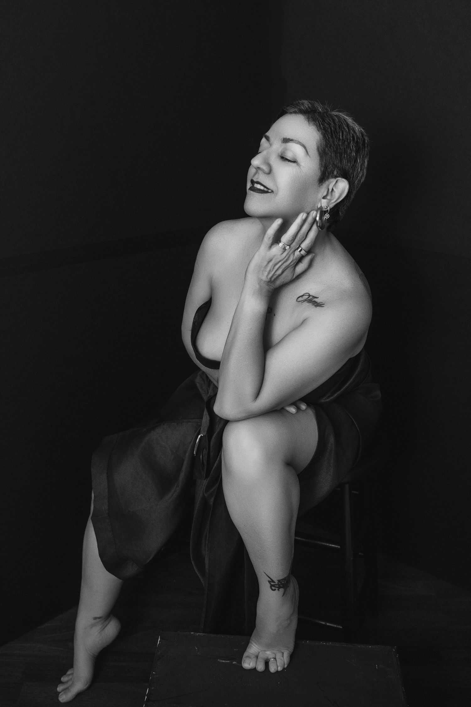Moody black and white artistic portraits with dramatic shadows.