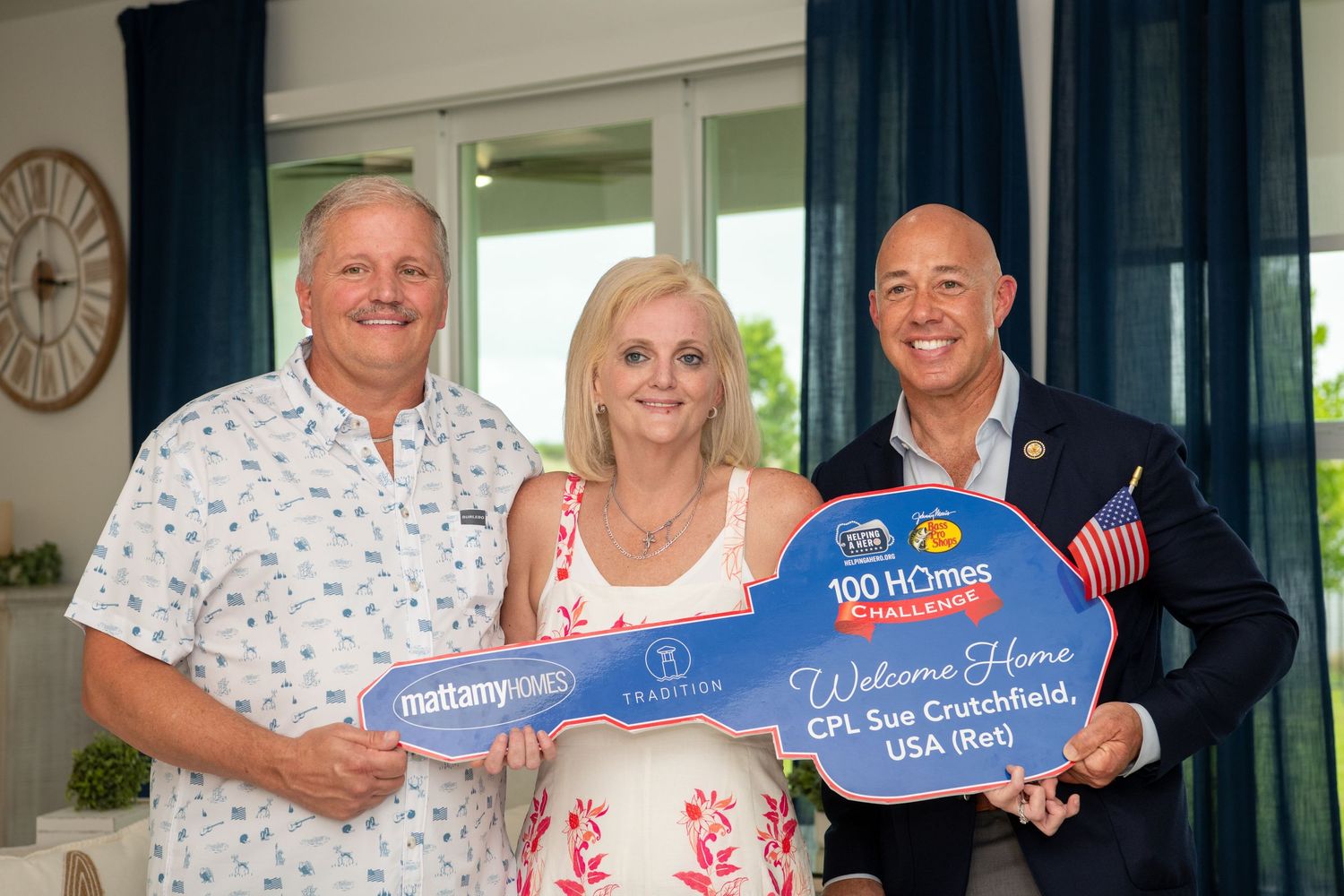Congressmen Brian mast celebrating with large Publishers Clearing House style prize check presentation to local veteran