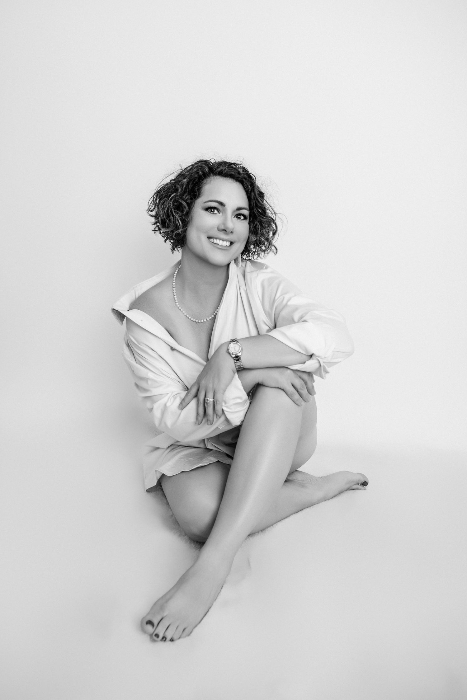 Minimalist boudoir photography series with casual poses on white background.