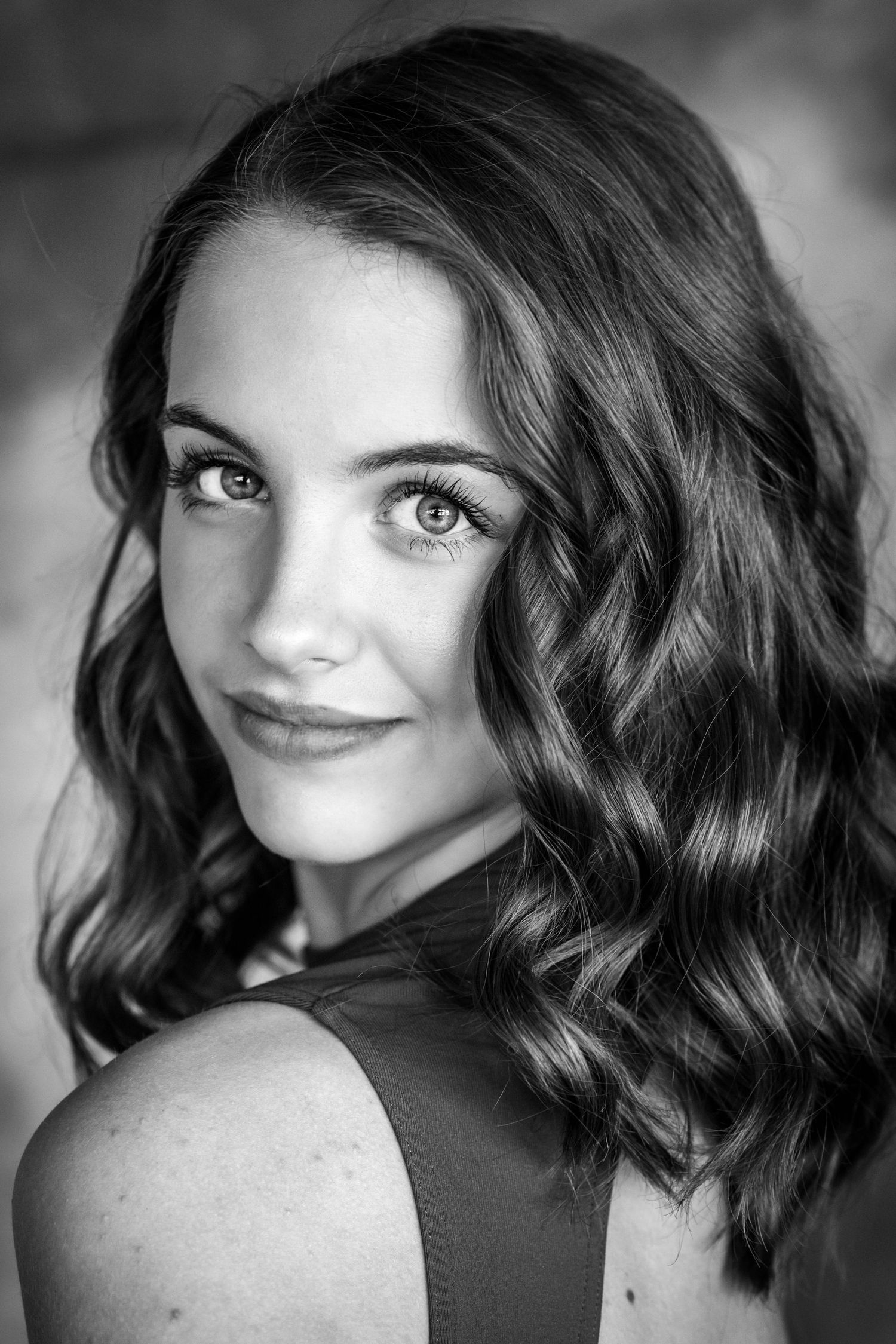 Black and white glamour portraits showing different poses and lighting effects.