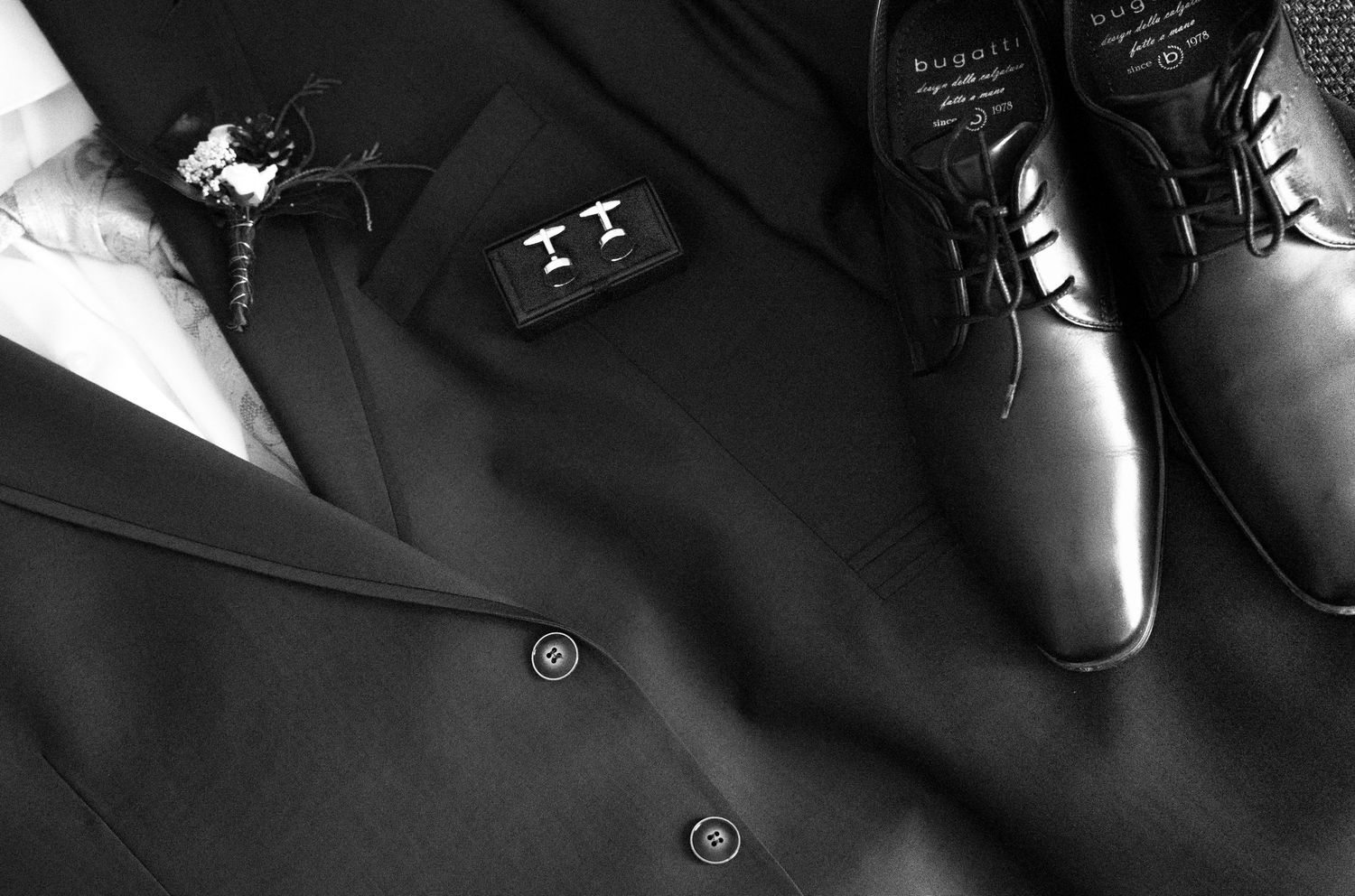 Artistic black and white detail shot of formal dress shoes.