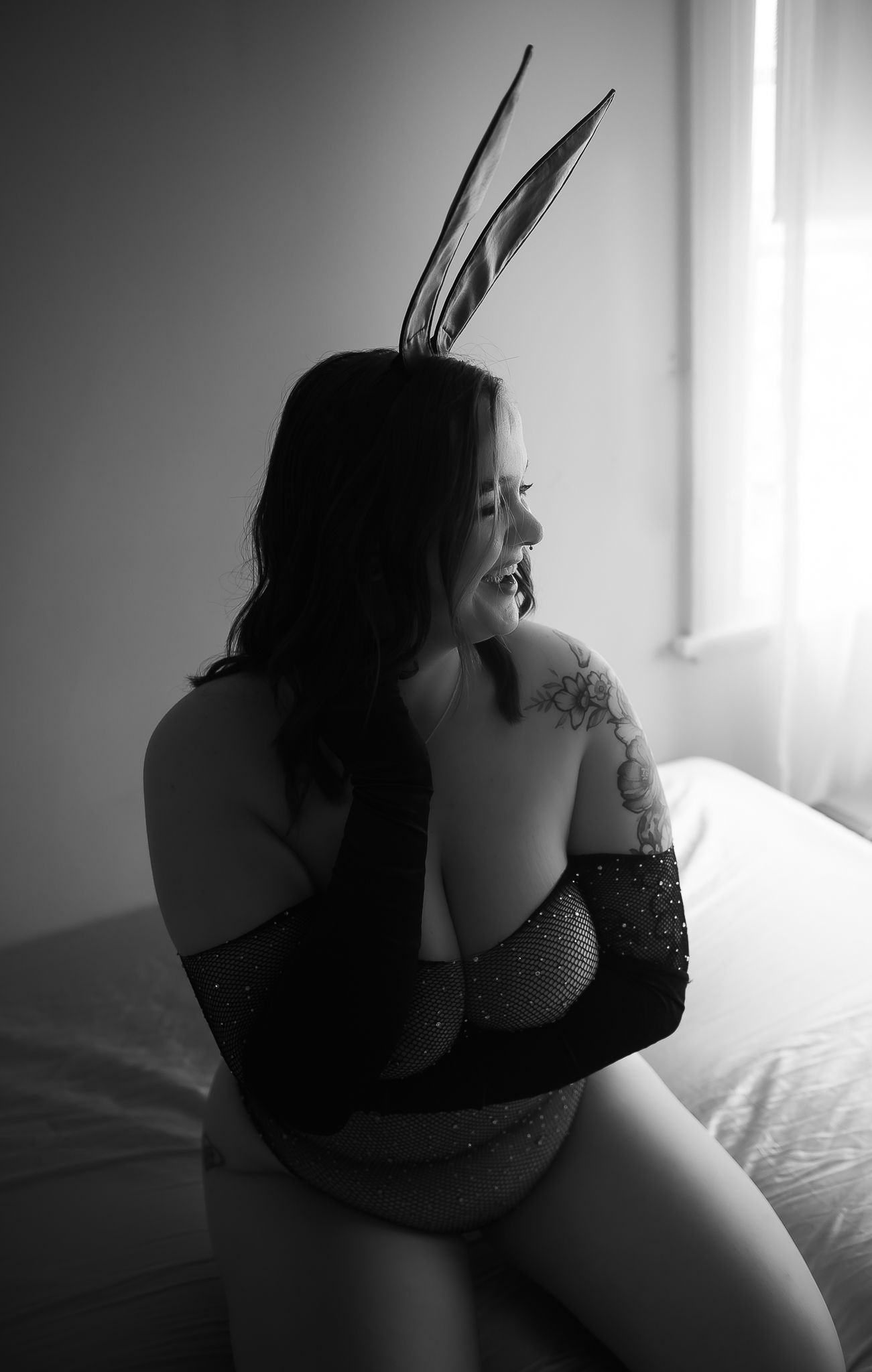 Woman poses in Bad Bunny bonus set for boudoir photoshoot at SeduXion Studio in Mandurah WA. Boudoir photographer Mandurah