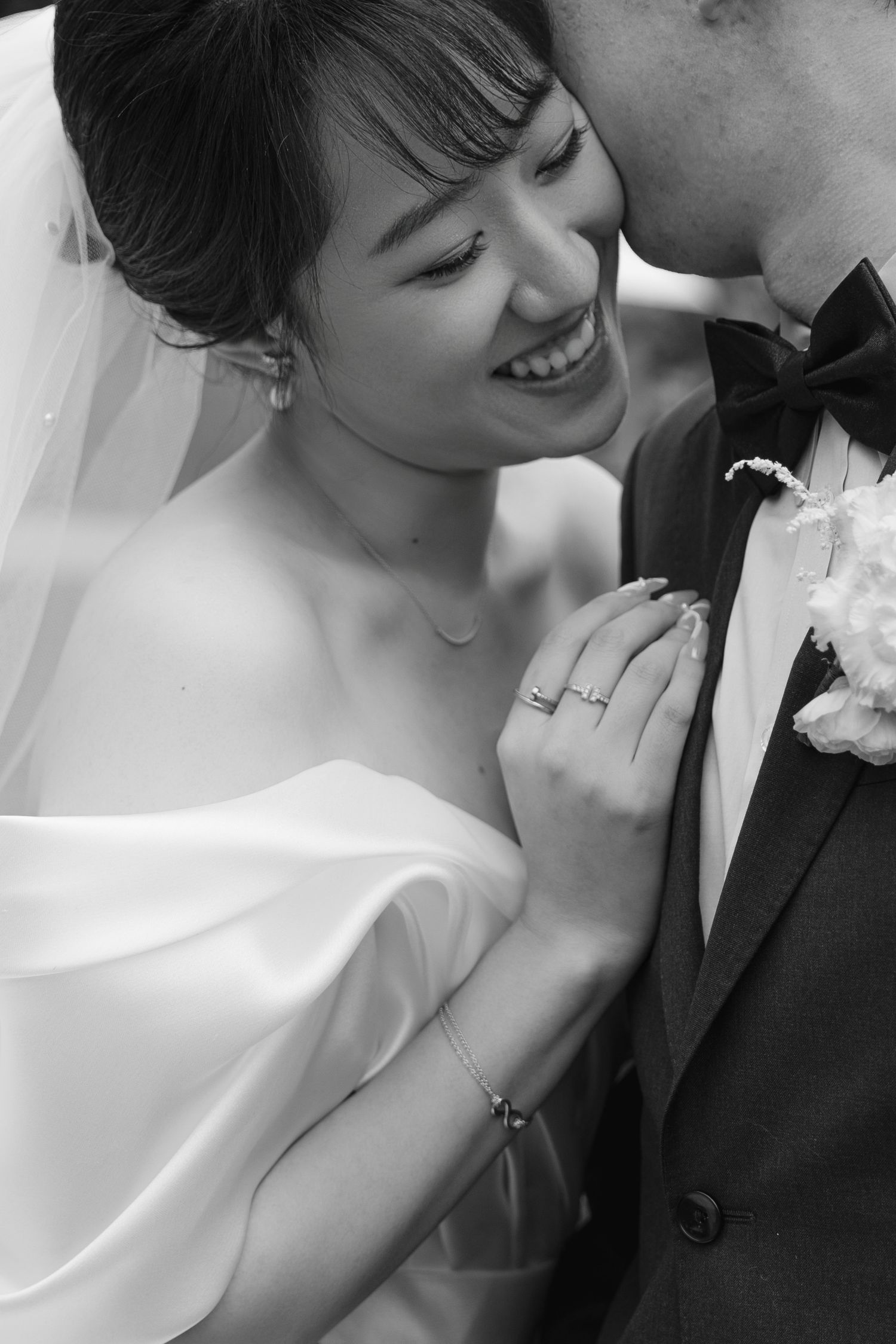 Intimate black and white wedding portraits showing tender moments.
