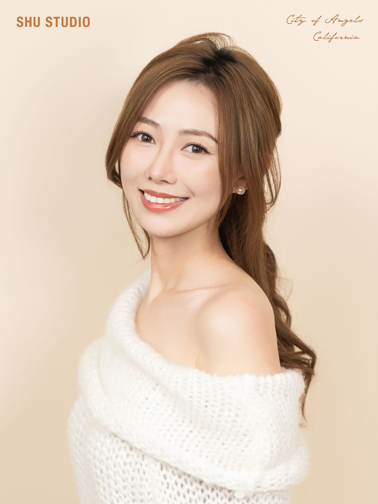 Warm-toned studio portraits in cozy white knit sweater.