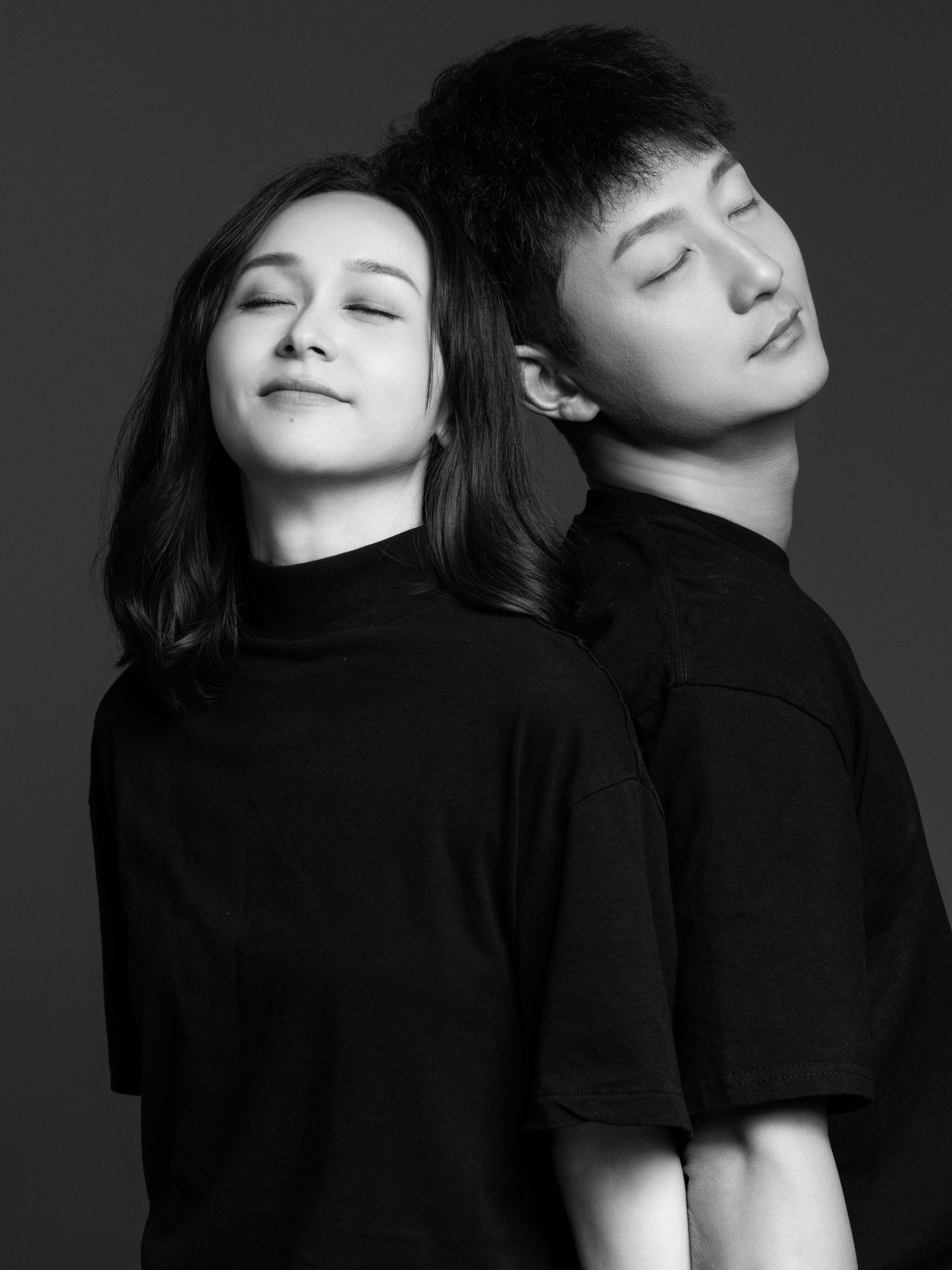 Minimalist black and white portraits showing connection between two subjects.