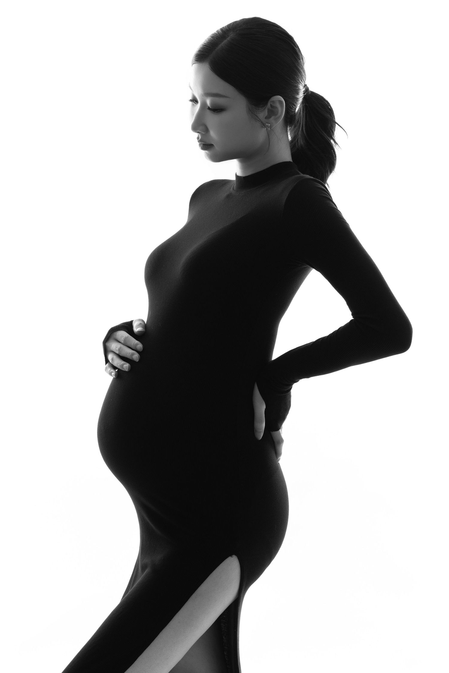 Artistic silhouette series showing dynamic poses in black against light background.