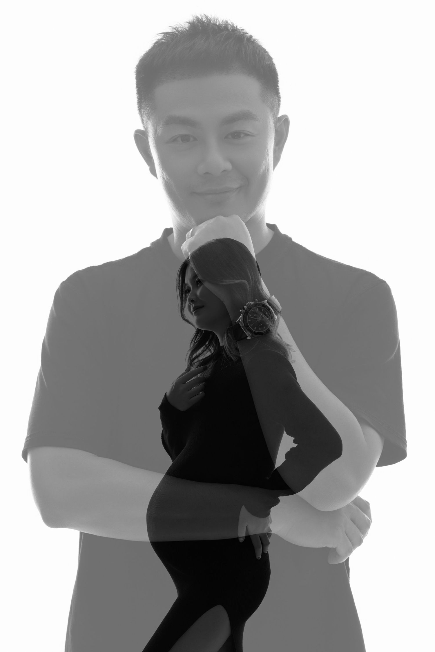 Silhouetted figures in casual wear against white background.