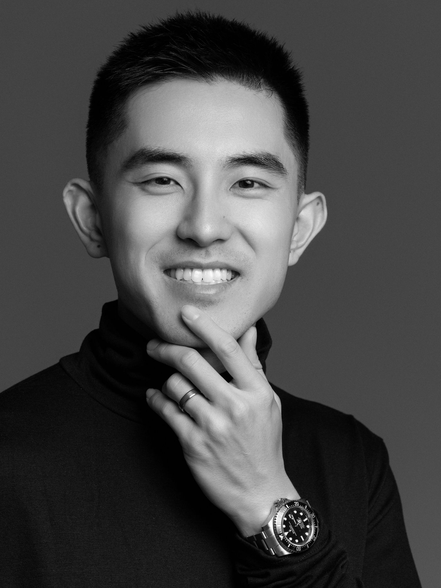 Black and white headshots showing range of expressions and emotions.