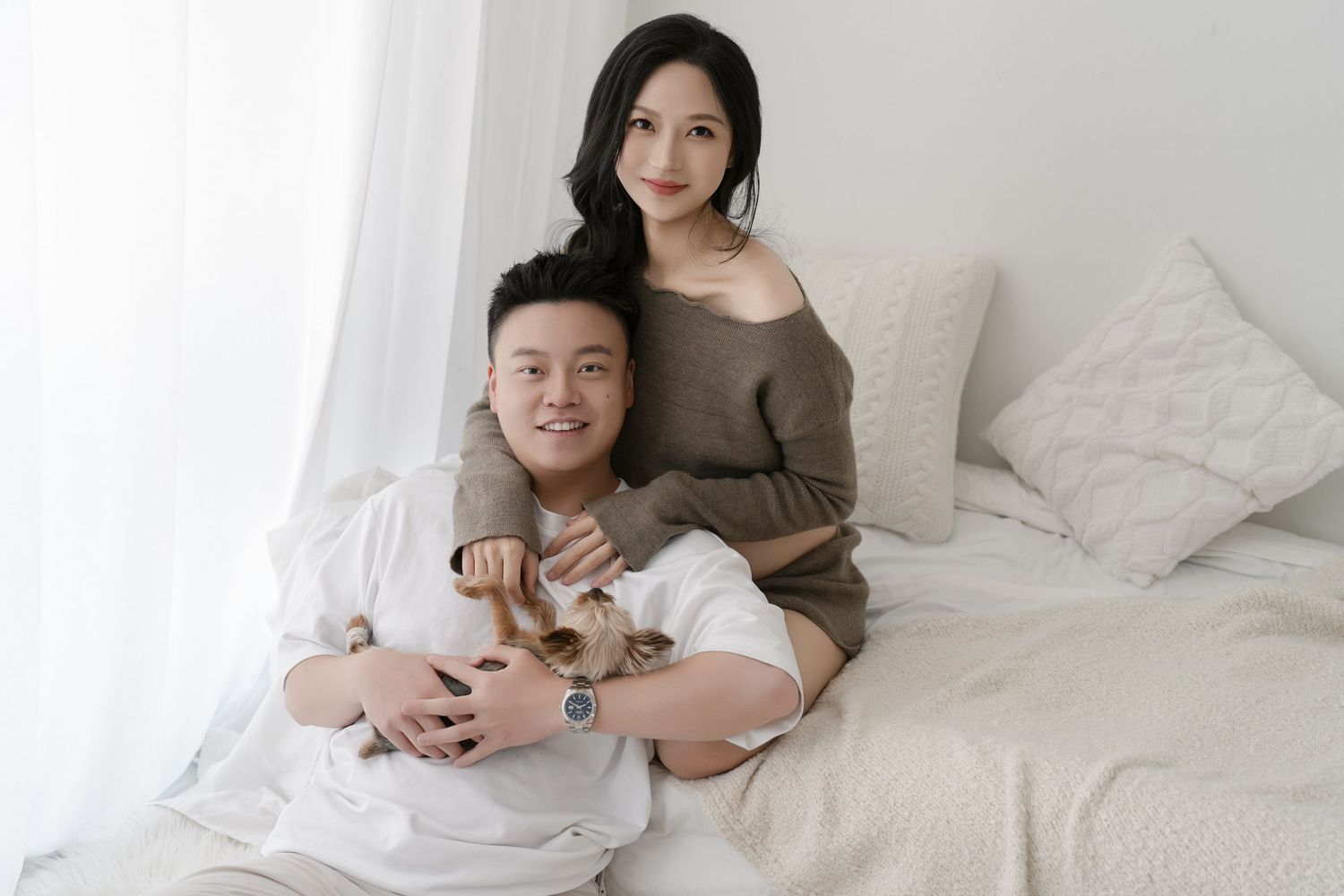 Cozy maternity bedroom photos with casual intimate moments.