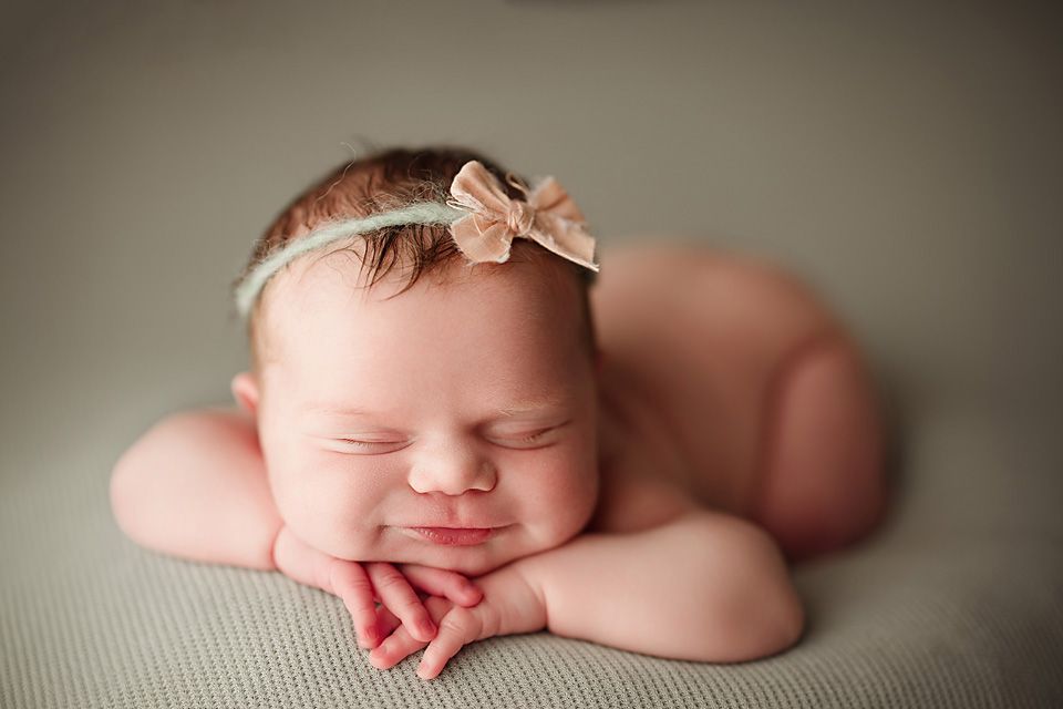 Peaceful newborn baby girl sleeping with chin on newborn photographer Richmond Chesterfield midlothian Petersburg glen Allen short pump