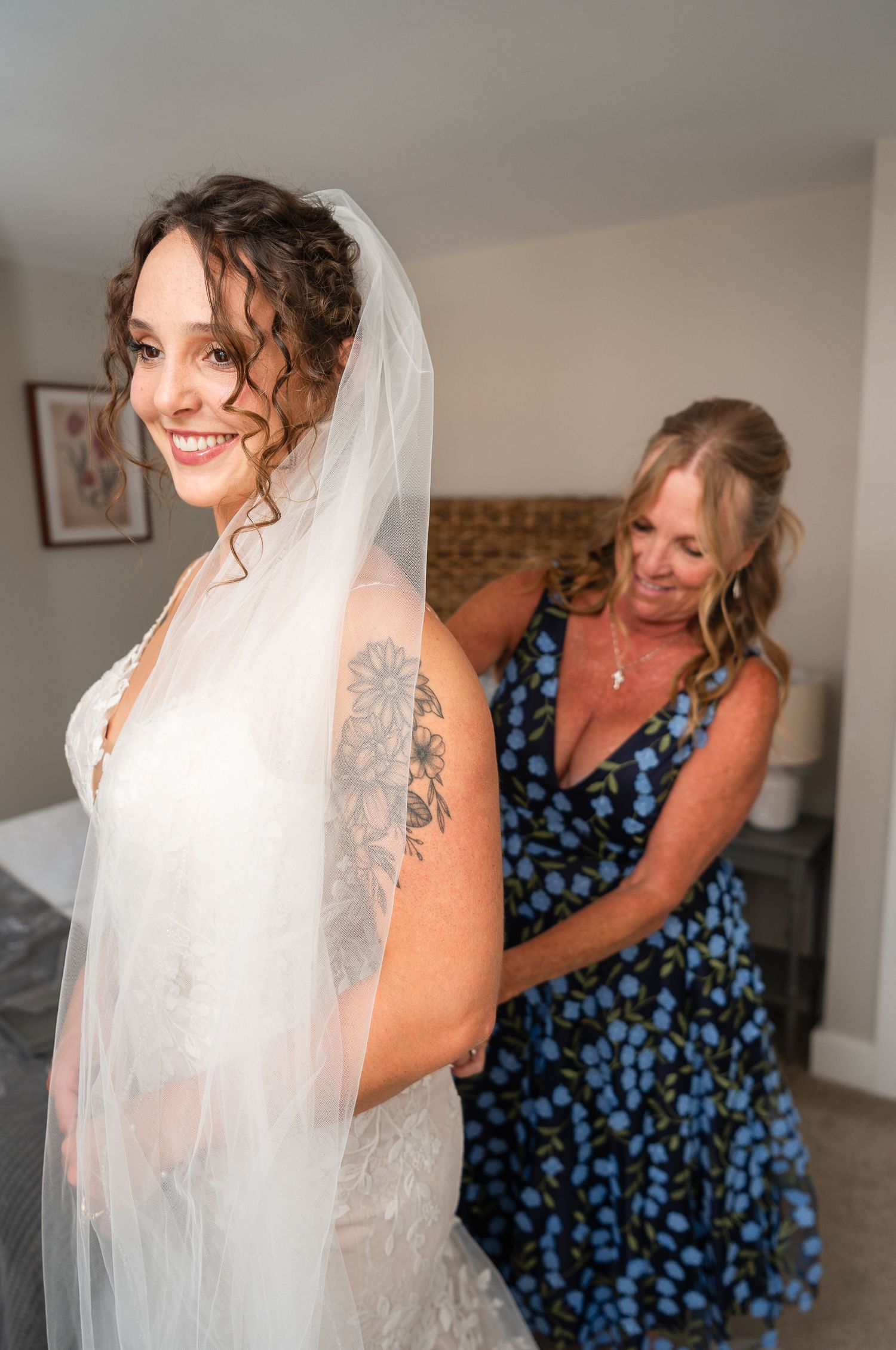 A series of photos showing someone helping a bride adjust her wedding veil in a bright indoor setting.