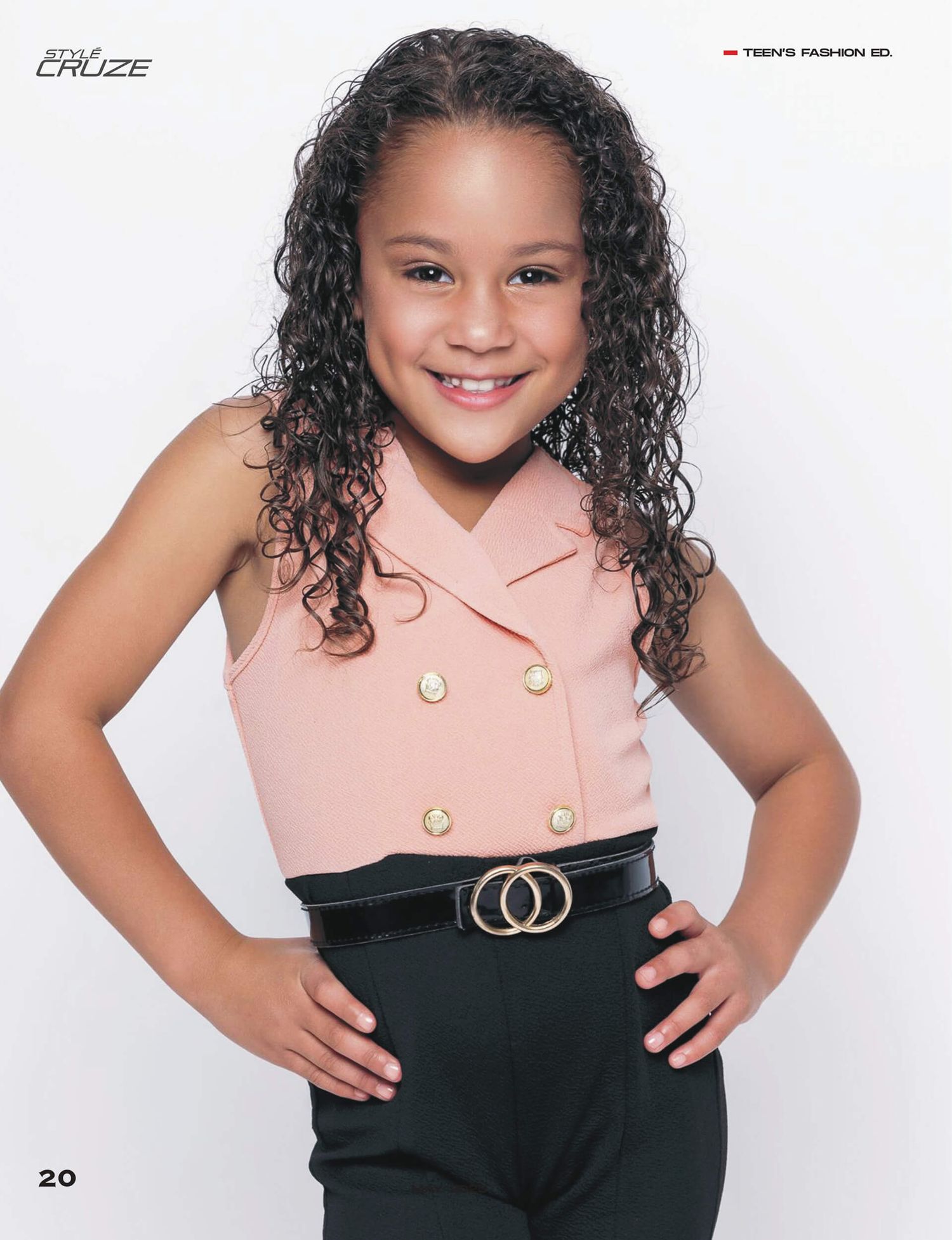 Young girl smiling in pink sleeveless top and black pants for teens fashion editorial.